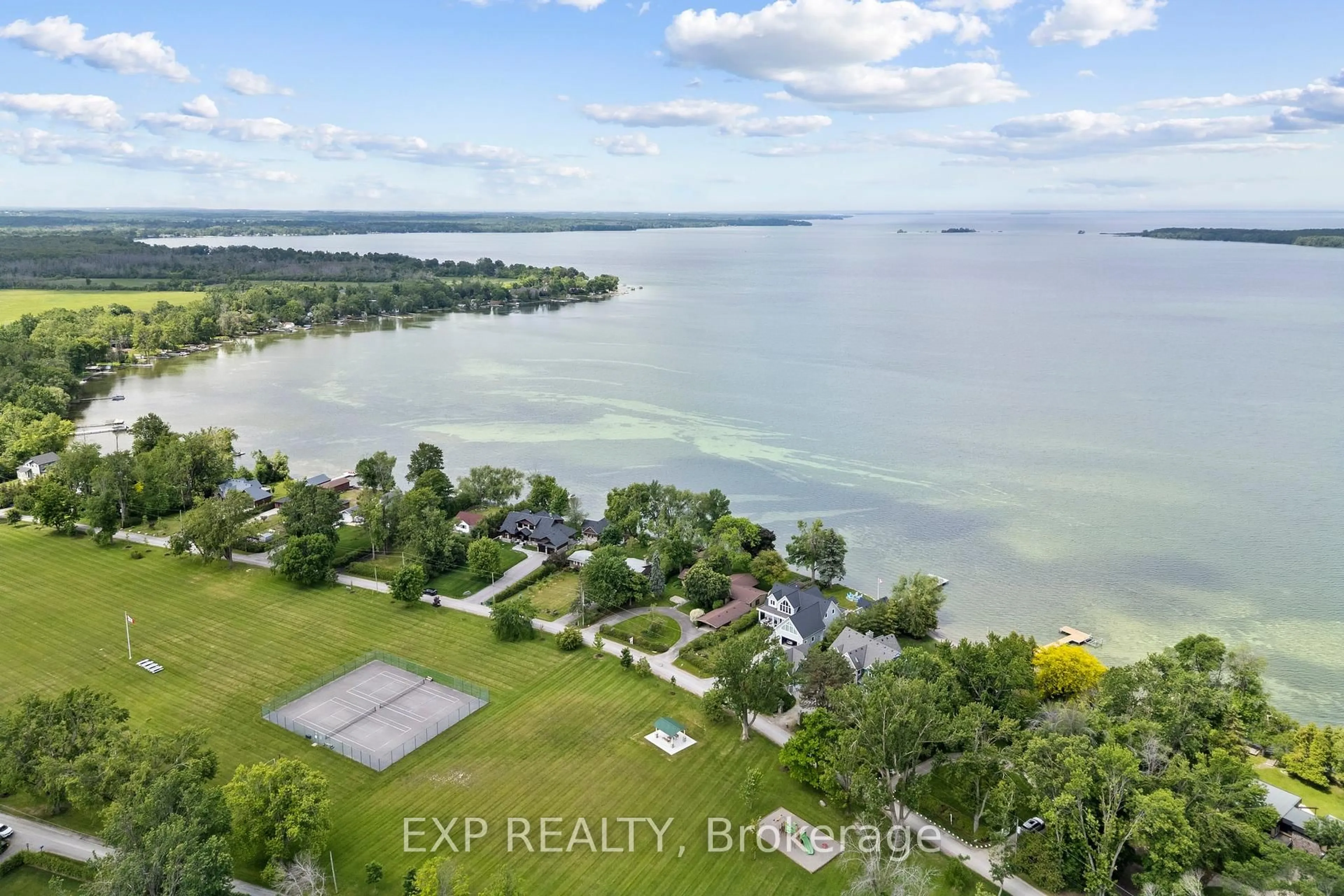 A pic from outside/outdoor area/front of a property/back of a property/a pic from drone, water/lake/river/ocean view for 638 Duclos Point Rd, Georgina Ontario L0E 1N0