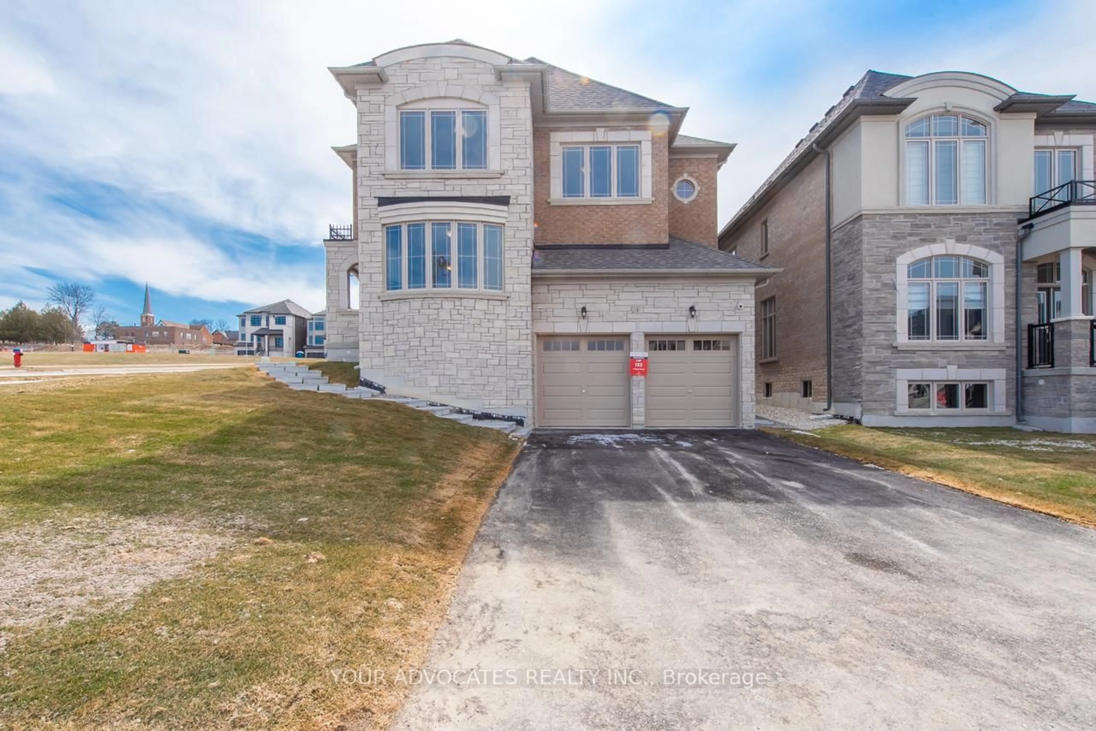 A pic from outside/outdoor area/front of a property/back of a property/a pic from drone, street for 1 Cunningham Dr, Bradford West Gwillimbury Ontario L0G 1B0