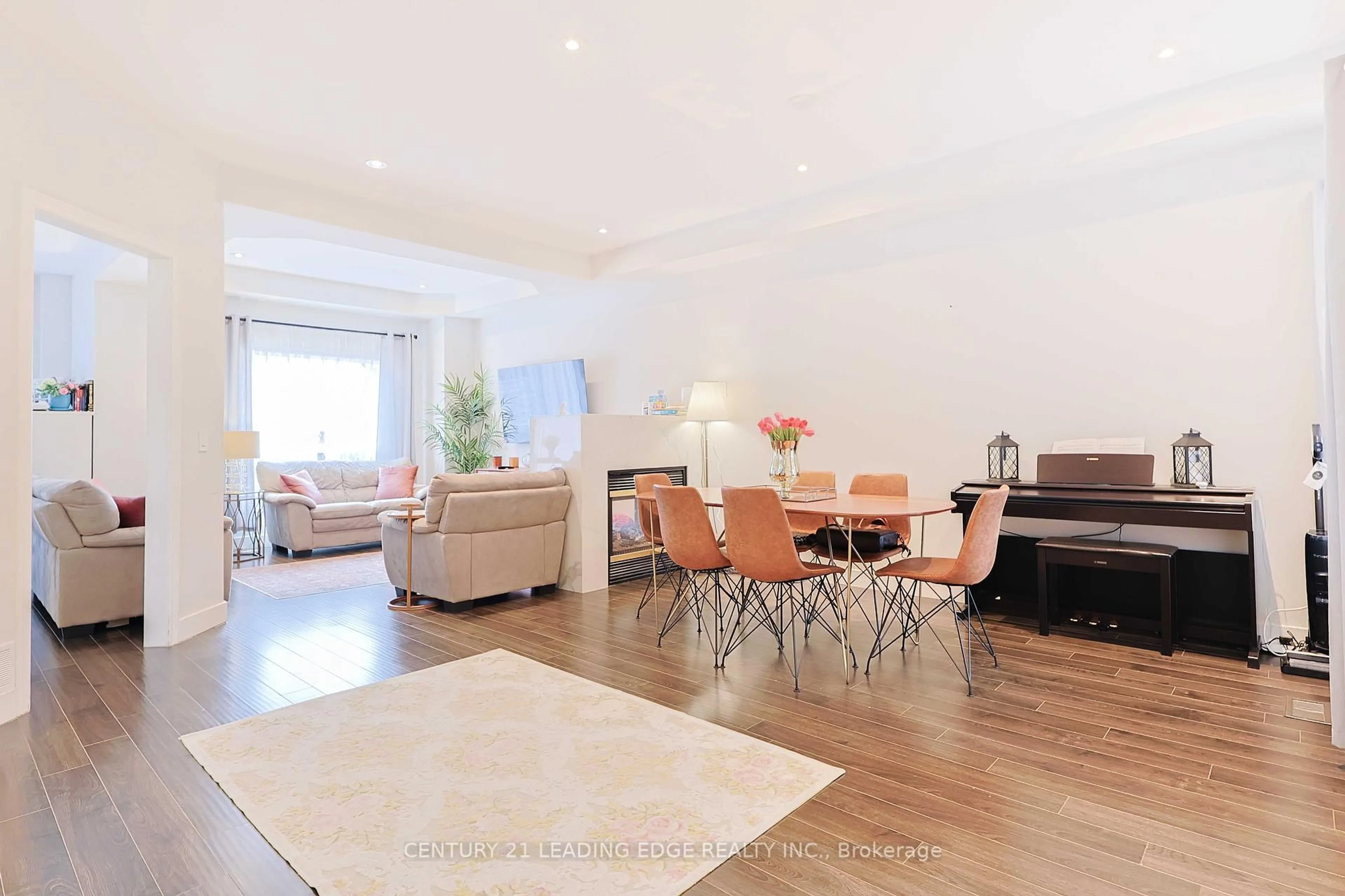 Living room with furniture, wood/laminate floor for 28 Sylwood Cres, Vaughan Ontario L6A 2R1