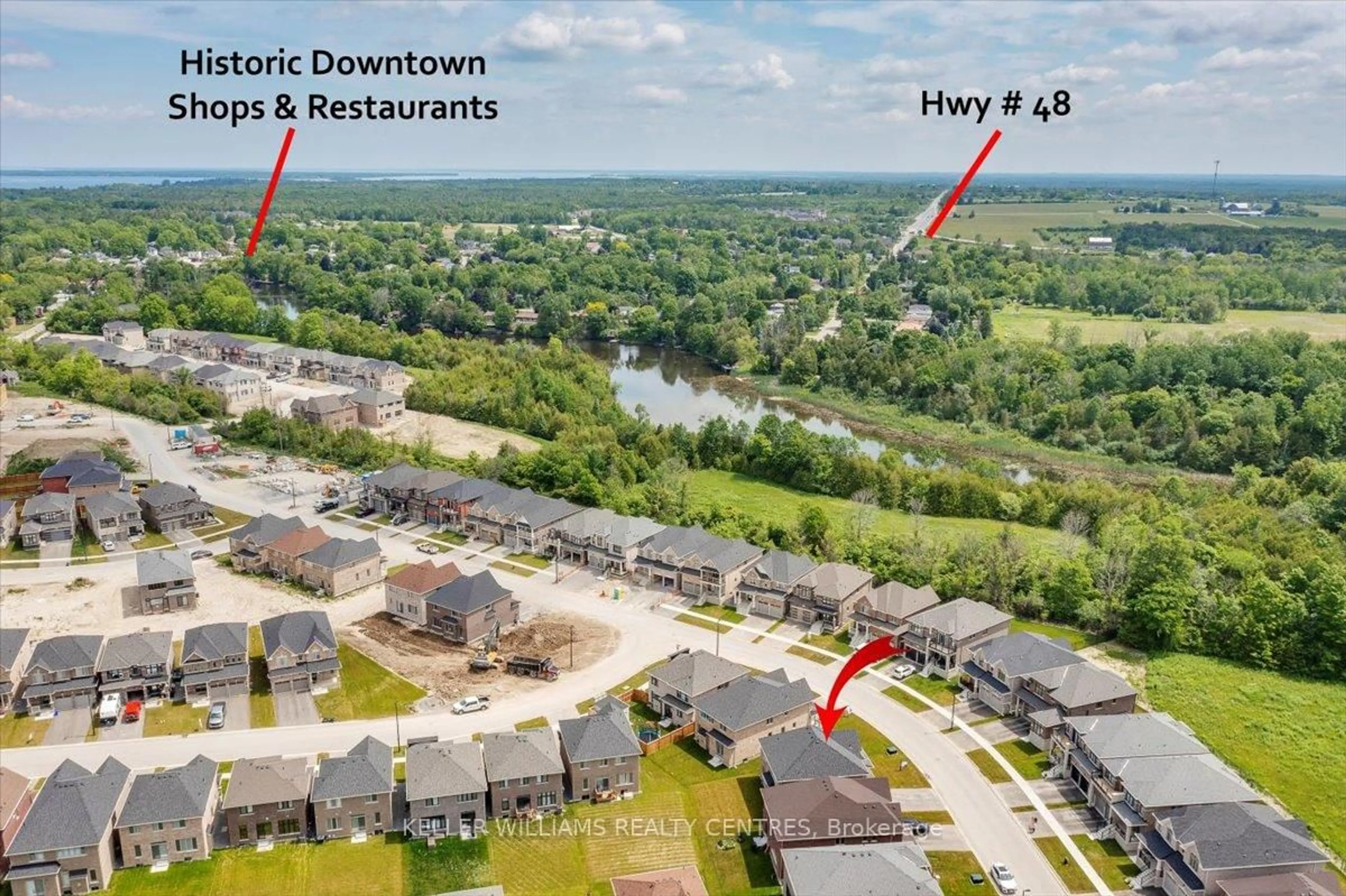 A pic from outside/outdoor area/front of a property/back of a property/a pic from drone, water/lake/river/ocean view for 60 Big Canoe Dr, Georgina Ontario L0E 1R0