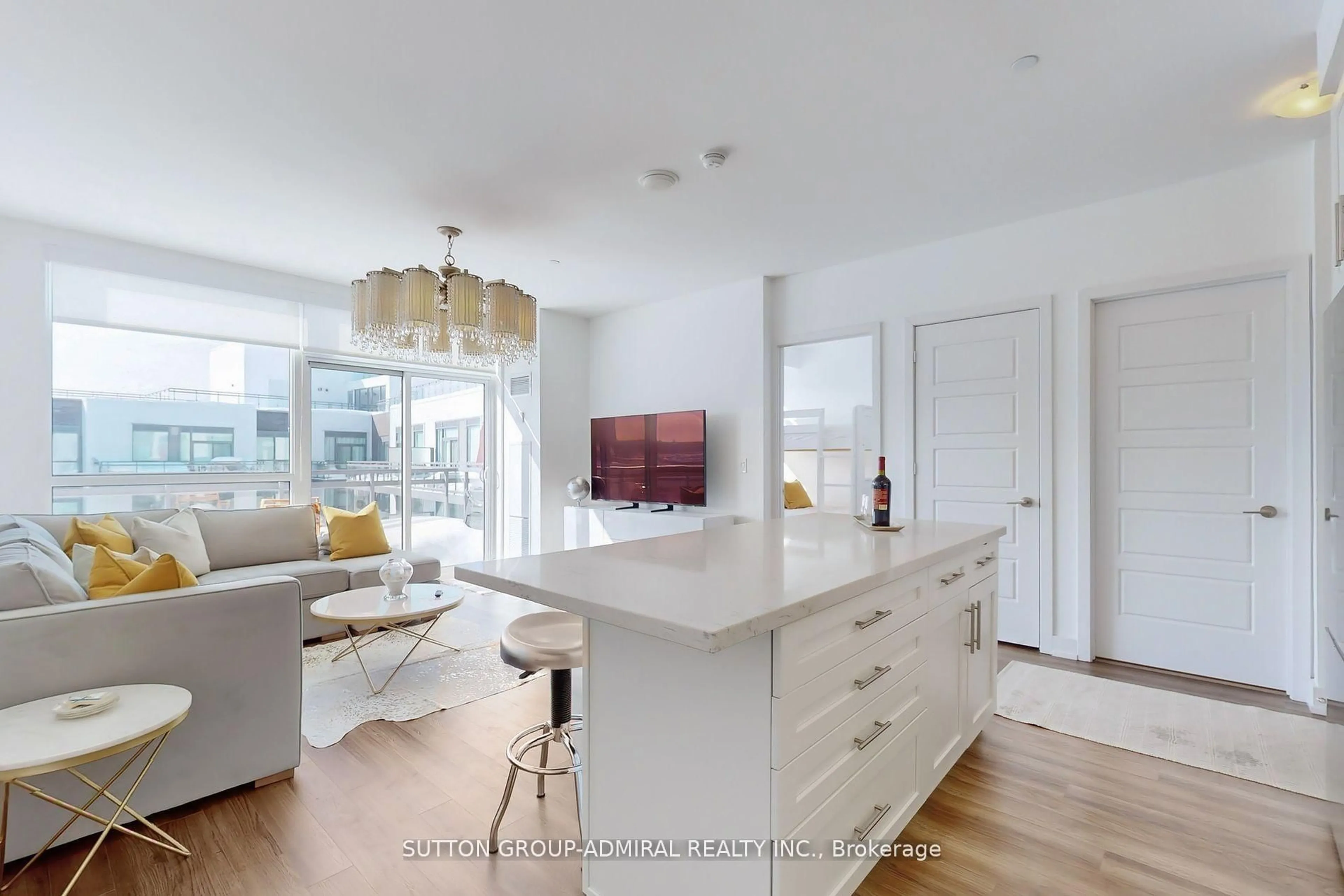 Open concept kitchen, wood/laminate floor for 301 Sea Ray Ave #C420, Innisfil Ontario L9S 0L8