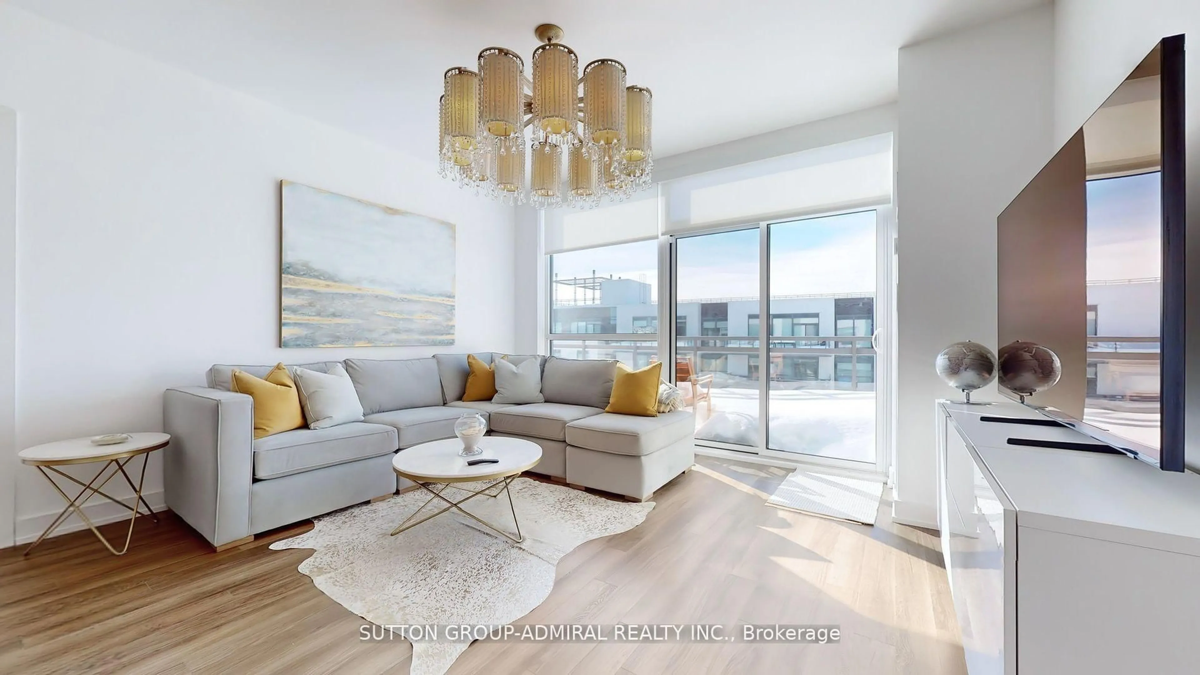 Living room with furniture, wood/laminate floor for 301 Sea Ray Ave #C420, Innisfil Ontario L9S 0L8