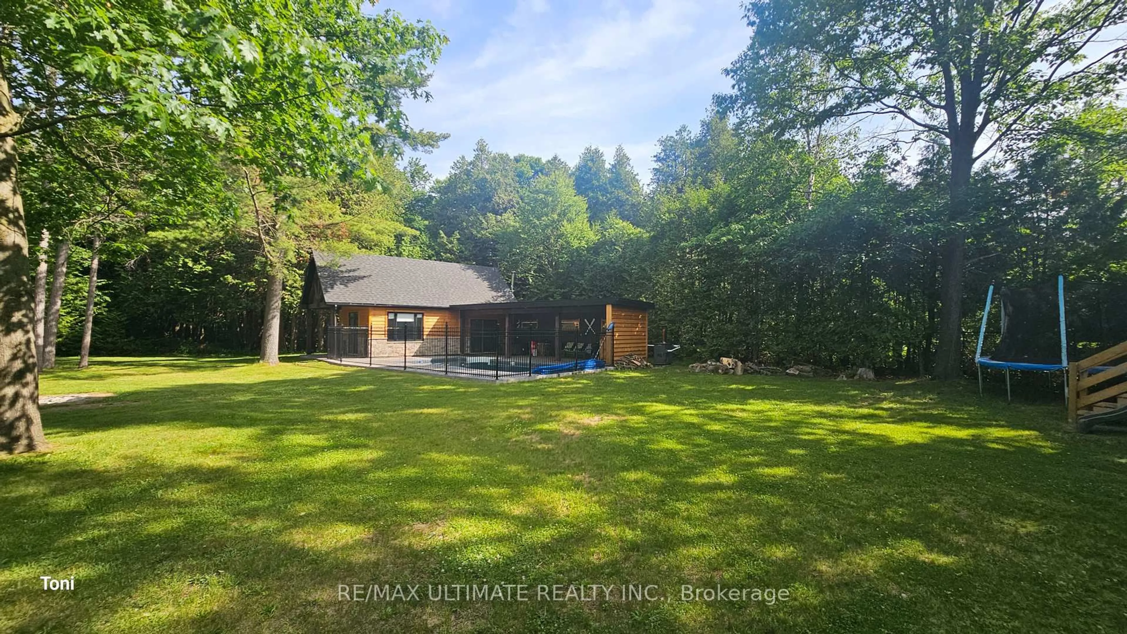 A pic from outside/outdoor area/front of a property/back of a property/a pic from drone, forest/trees view for 57 Linda Rd, Georgina Ontario L0C 1L0