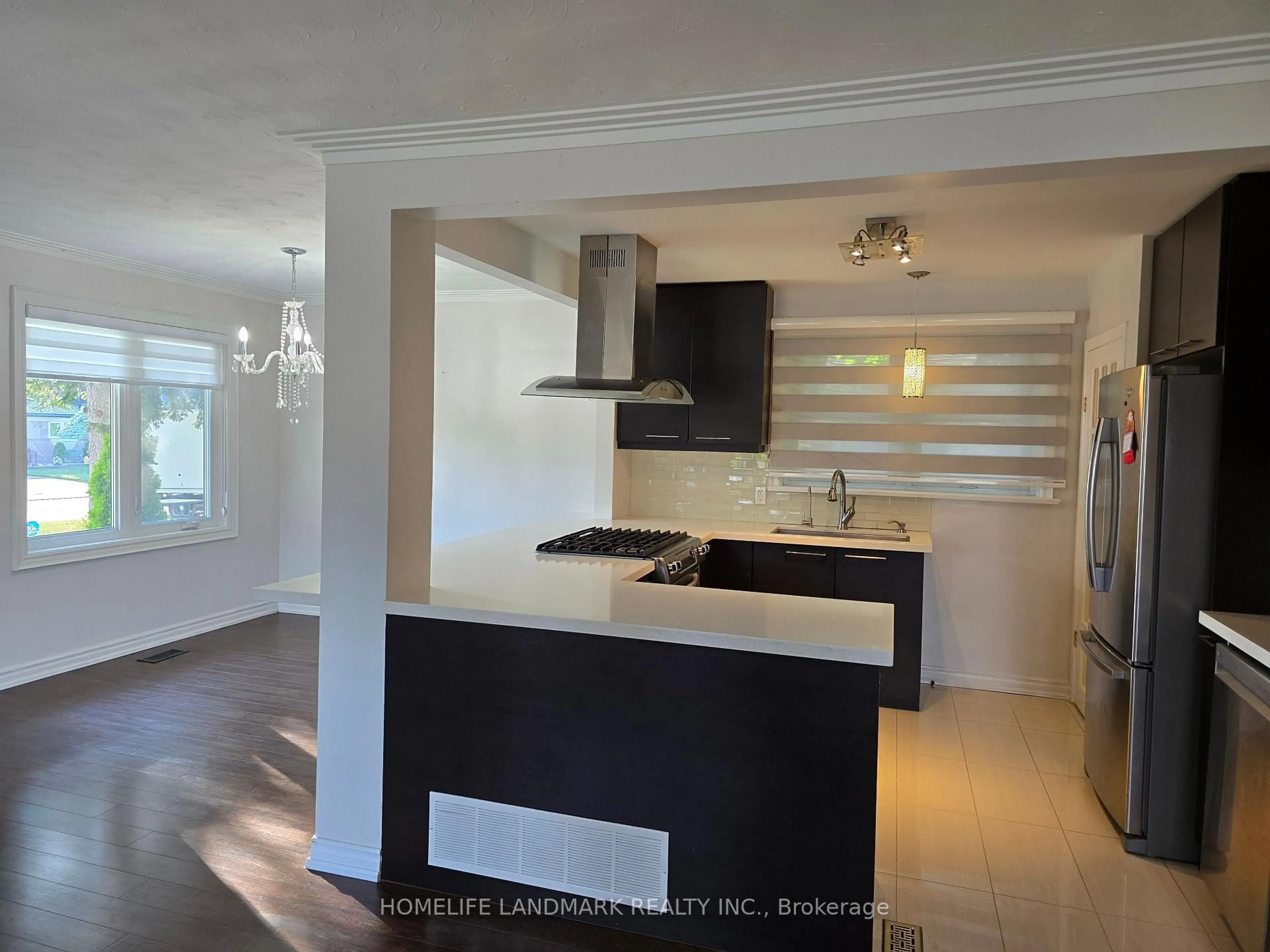 Open concept kitchen, wood/laminate floor for 283 Paliser Cres, Richmond Hill Ontario L4C 1R9