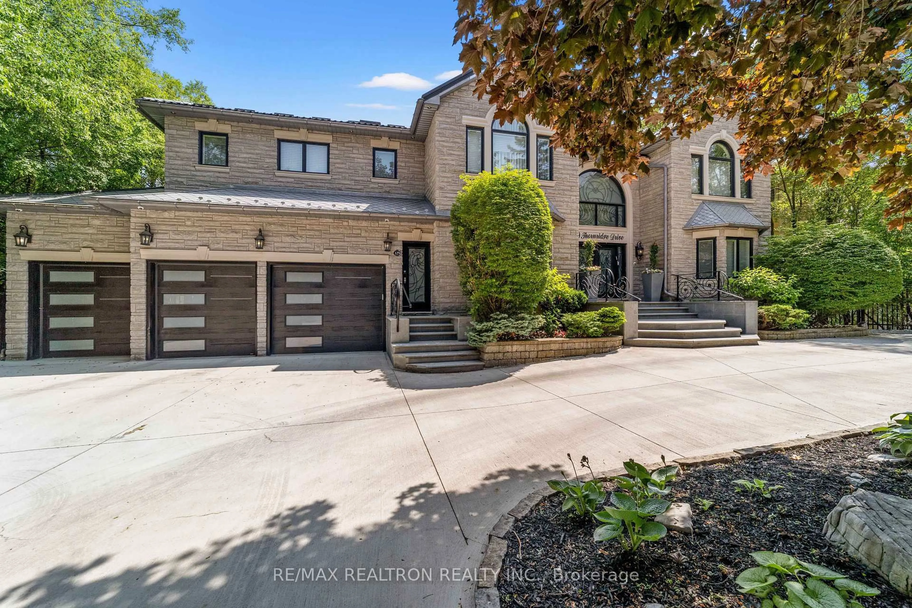 Home with brick exterior material, street for 129 Thornridge Dr, Vaughan Ontario L4J 1E4
