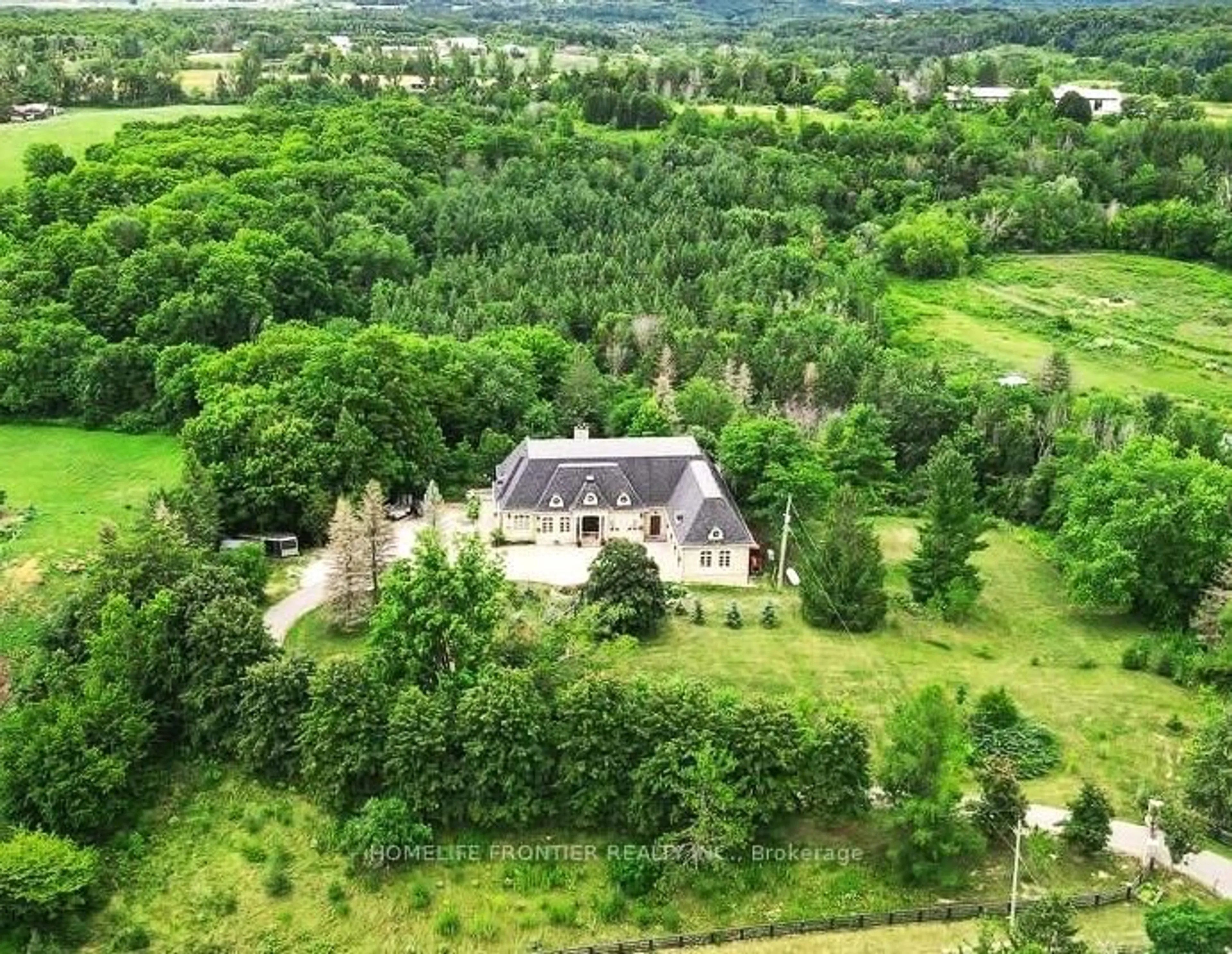 A pic from outside/outdoor area/front of a property/back of a property/a pic from drone, forest/trees view for 7645 16th Sdrd, King Ontario L7E 5R7
