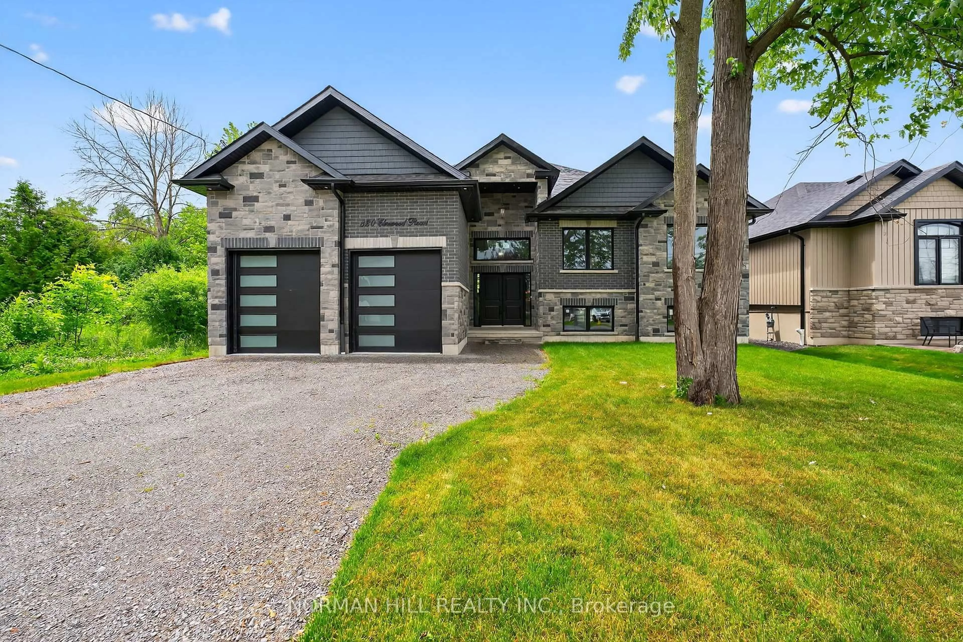 Home with brick exterior material, street for 820 Elmwood Rd, Georgina Ontario L4P 3E9