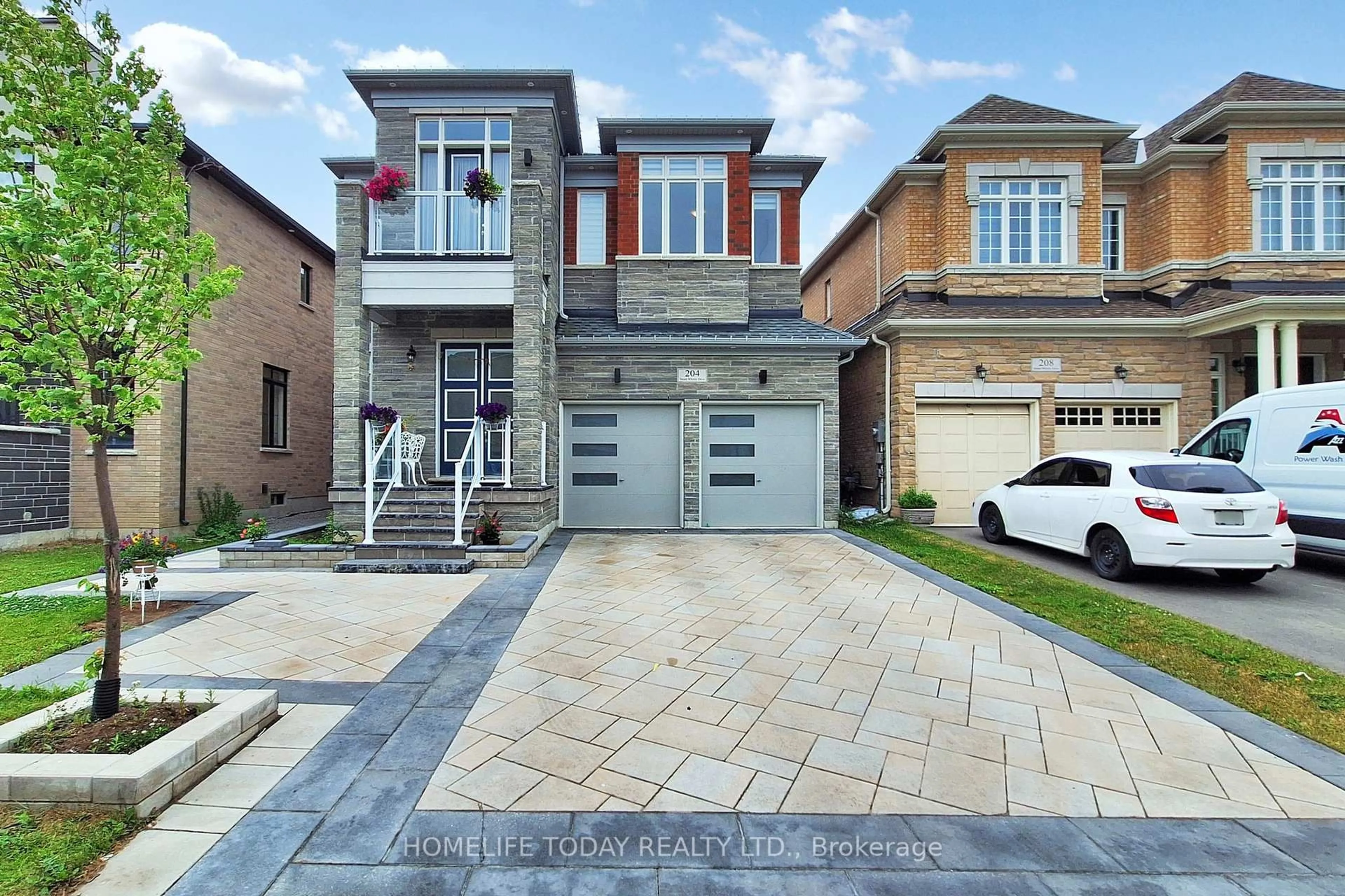 Home with brick exterior material, street for 204 Steam Whistle Dr, Whitchurch-Stouffville Ontario L4A 4X5