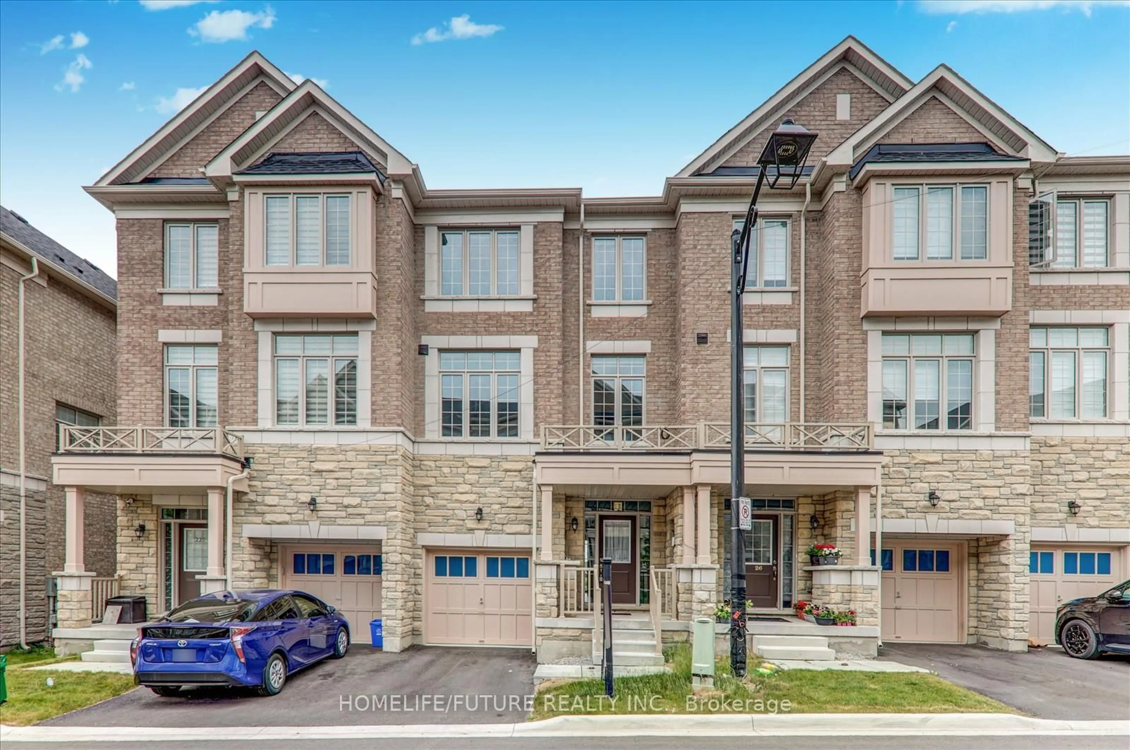 Home with brick exterior material, street for 24 Andress Way, Markham Ontario L3S 0E9