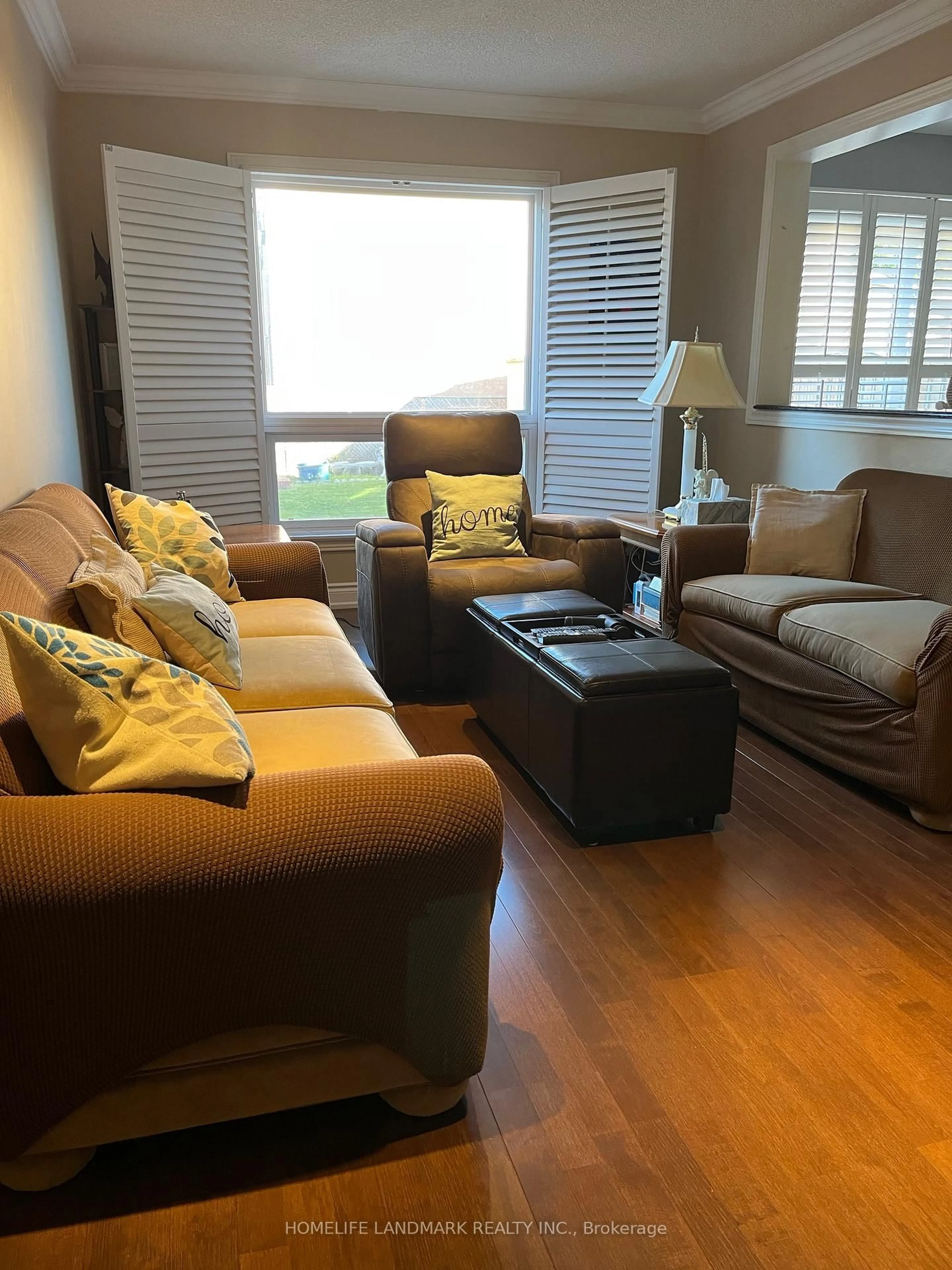 Living room with furniture, wood/laminate floor for 19 Eastern Rd, Vaughan Ontario L4L 8S2