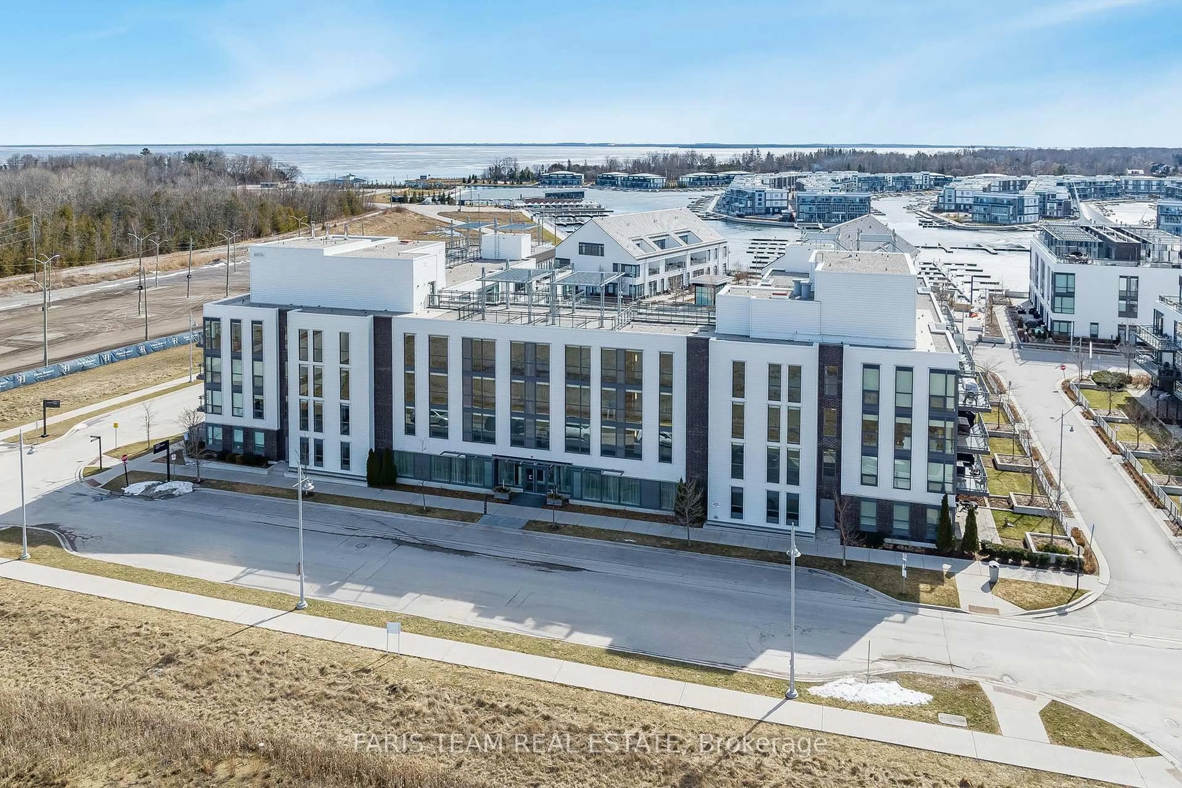 A pic from outside/outdoor area/front of a property/back of a property/a pic from drone, building for 241 Sea Ray Ave #305, Innisfil Ontario L9S 0L9