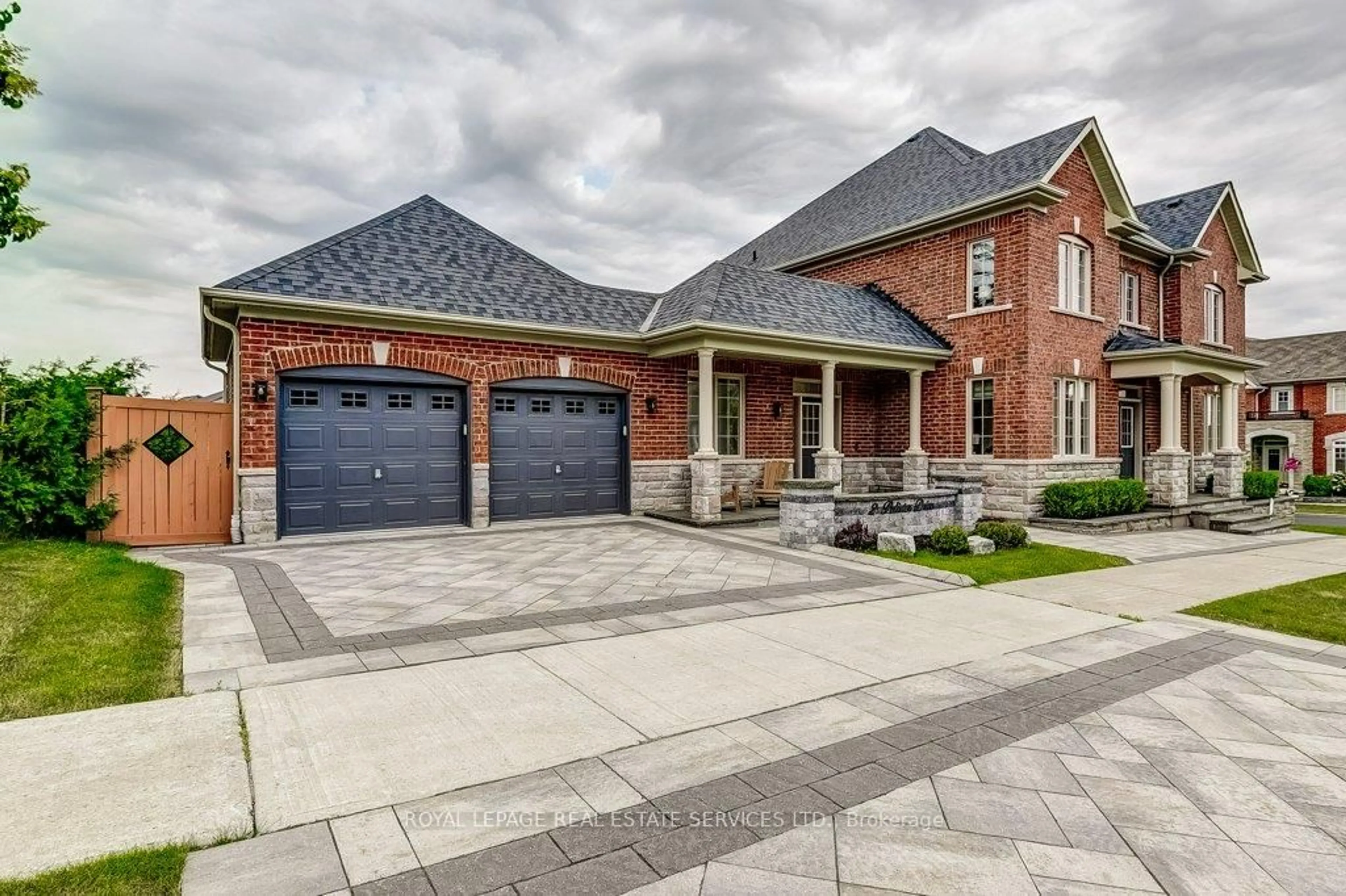 Home with brick exterior material, street for 2 Pelister Dr, Markham Ontario L6E 0M6