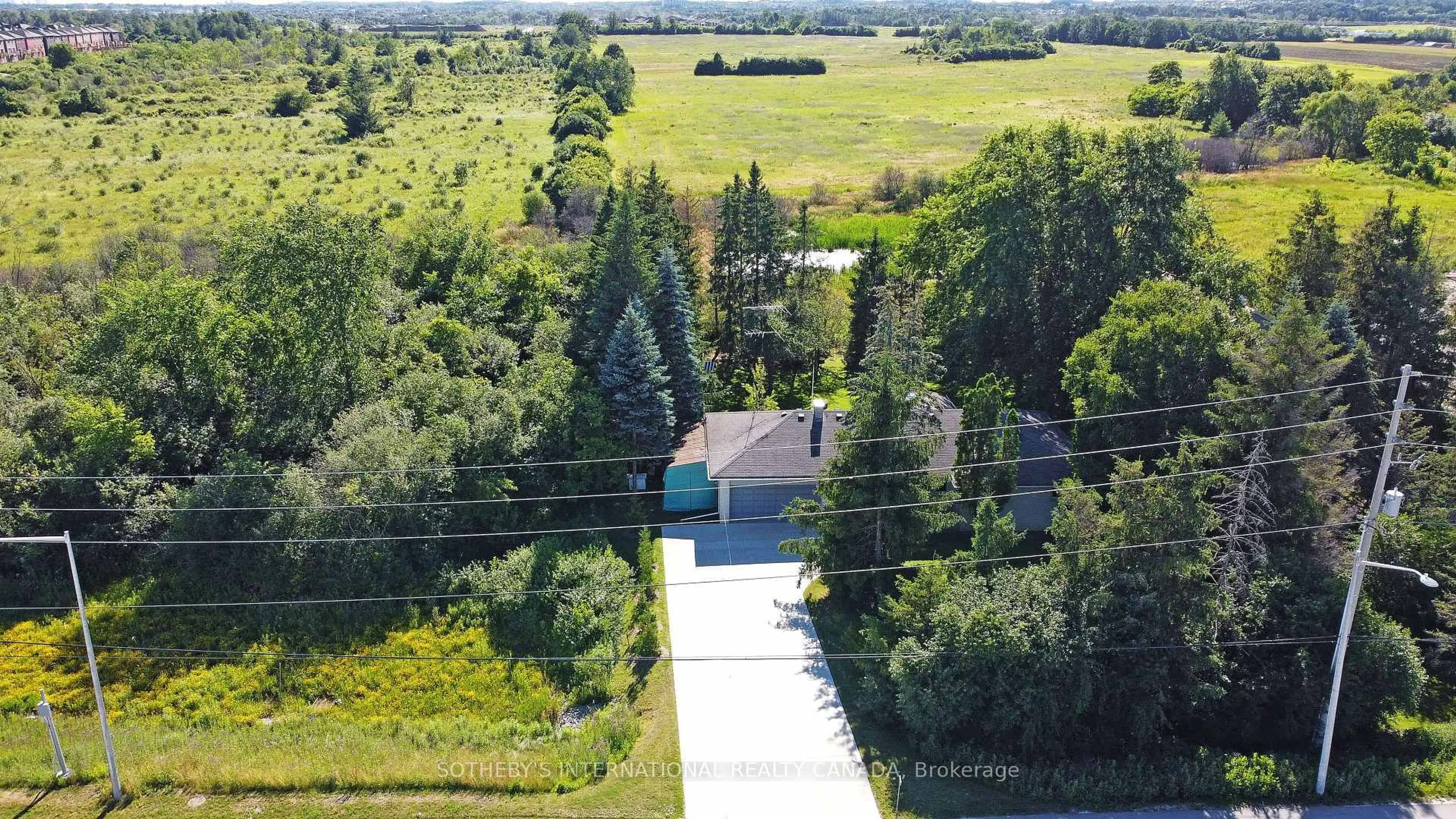 A pic from outside/outdoor area/front of a property/back of a property/a pic from drone, unknown for 11210 Leslie St, Richmond Hill Ontario L4S 1N2