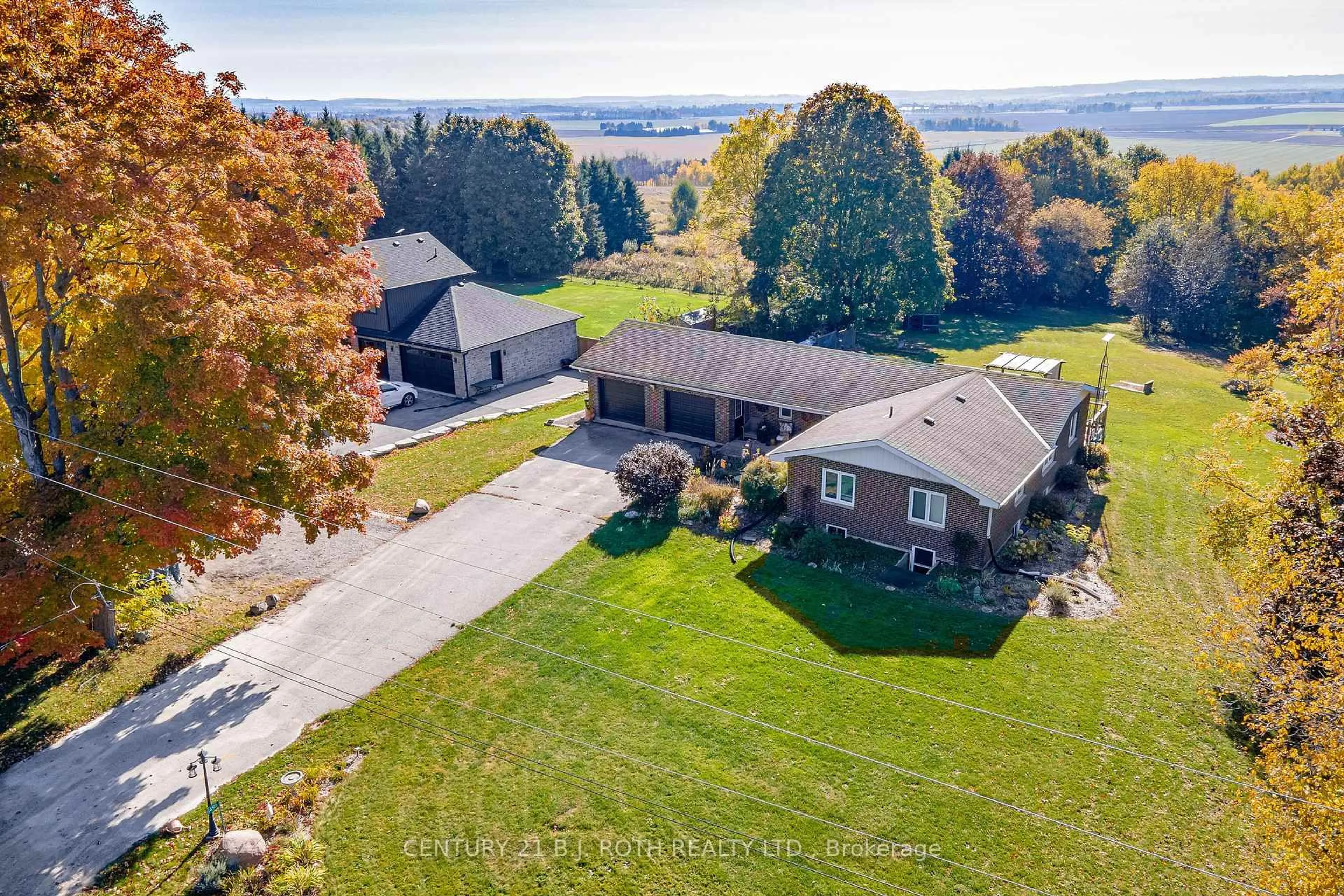 A pic from outside/outdoor area/front of a property/back of a property/a pic from drone, water/lake/river/ocean view for 6495 13th Line, New Tecumseth Ontario L9R 1V4