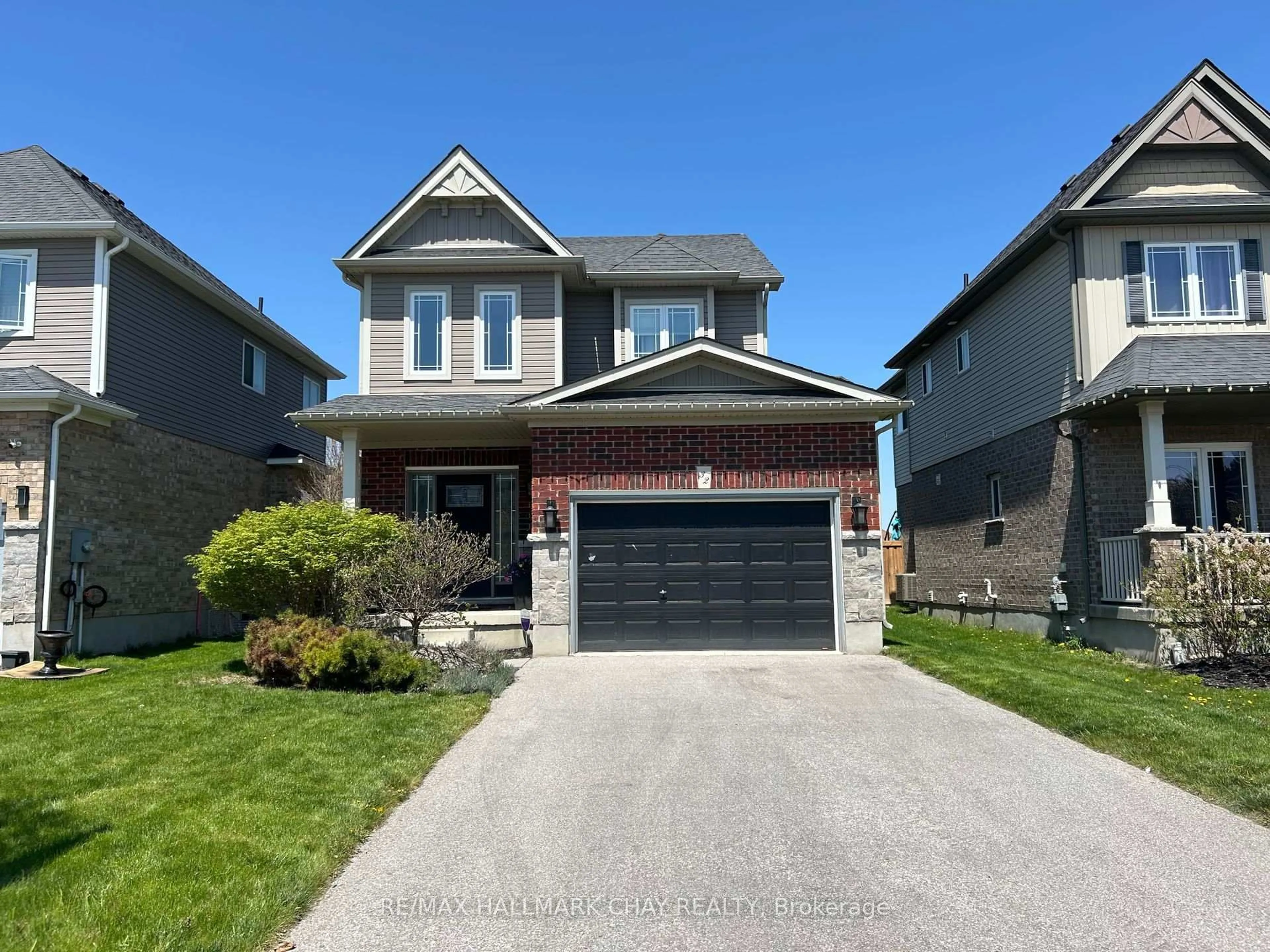 Home with brick exterior material, street for 32 Burt Ave, New Tecumseth Ontario L9R 0G8