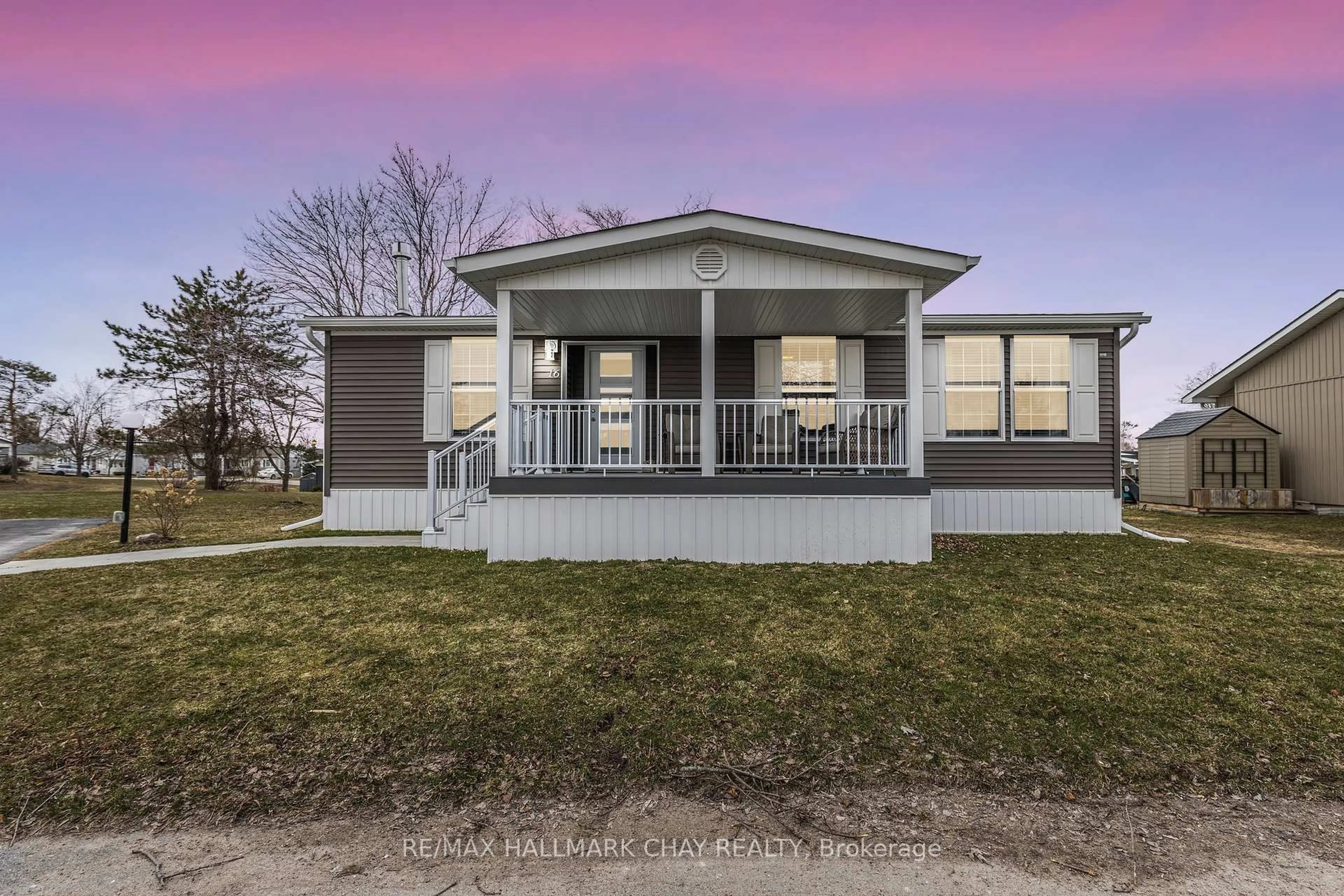 Home with vinyl exterior material, street for 16 Comforts Cove, Innisfil Ontario L9S 1S3