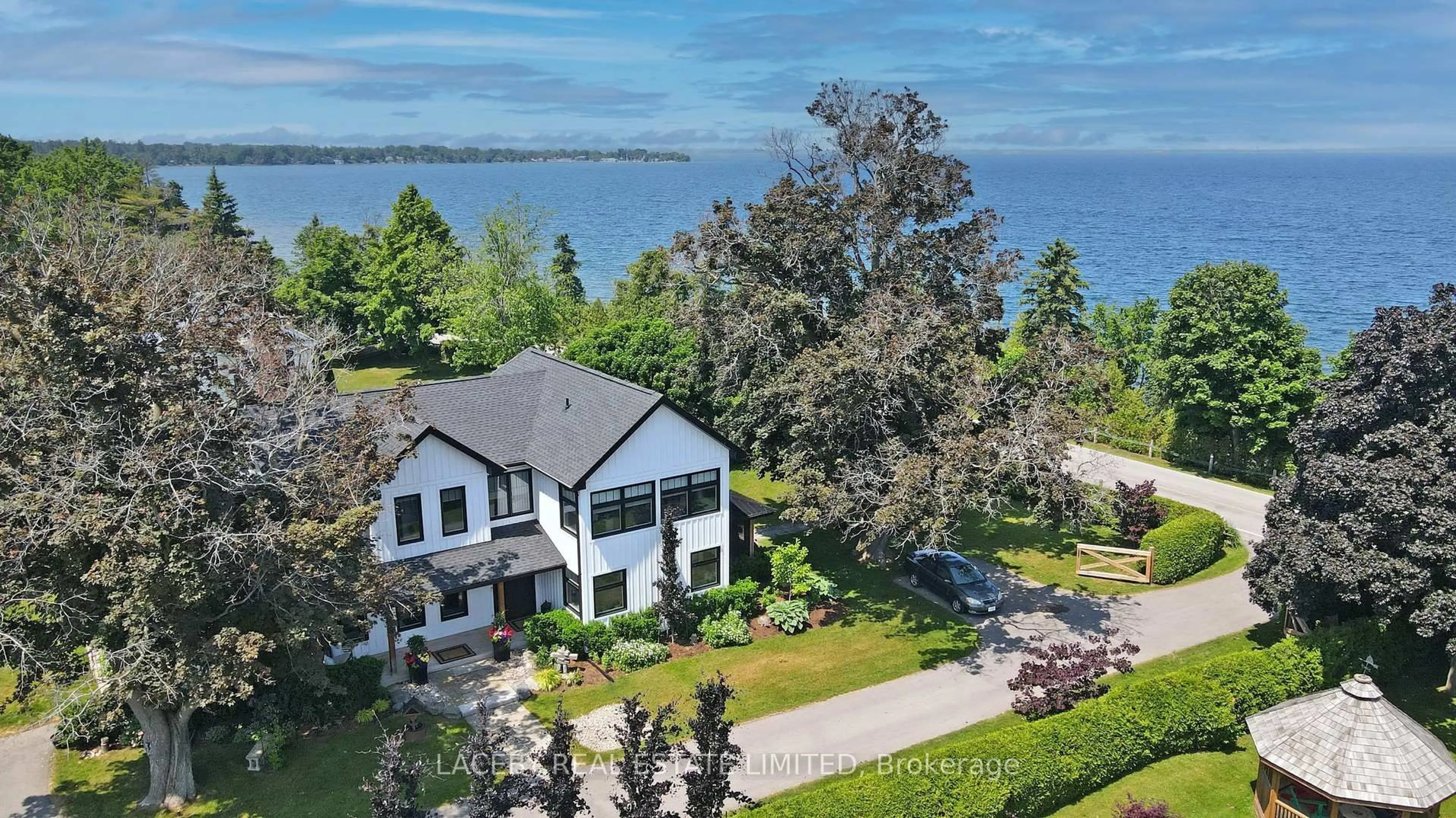 A pic from outside/outdoor area/front of a property/back of a property/a pic from drone, water/lake/river/ocean view for 343 Hedge Rd, Georgina Ontario L0E 1R0