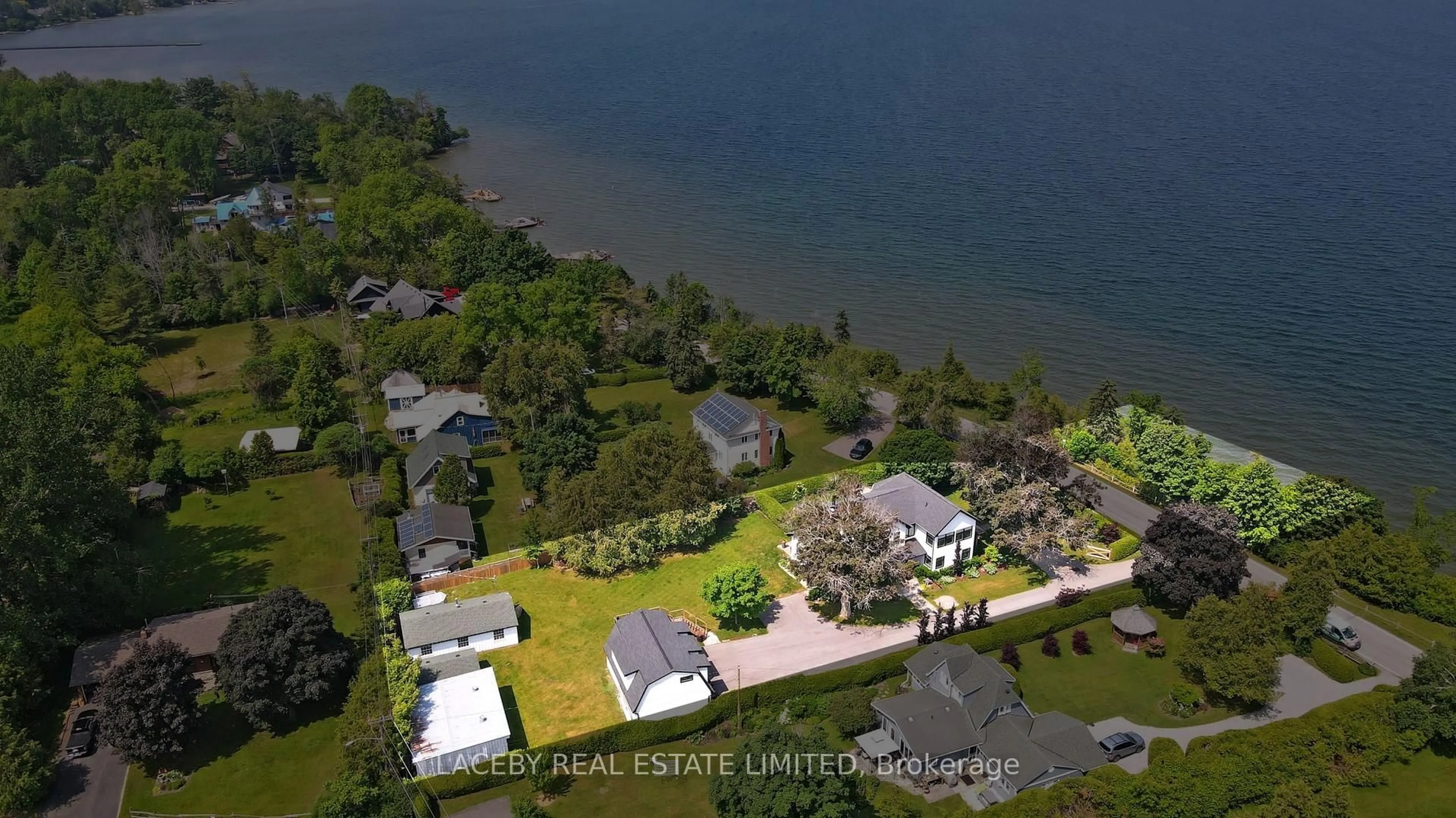 A pic from outside/outdoor area/front of a property/back of a property/a pic from drone, water/lake/river/ocean view for 343 Hedge Rd, Georgina Ontario L0E 1R0