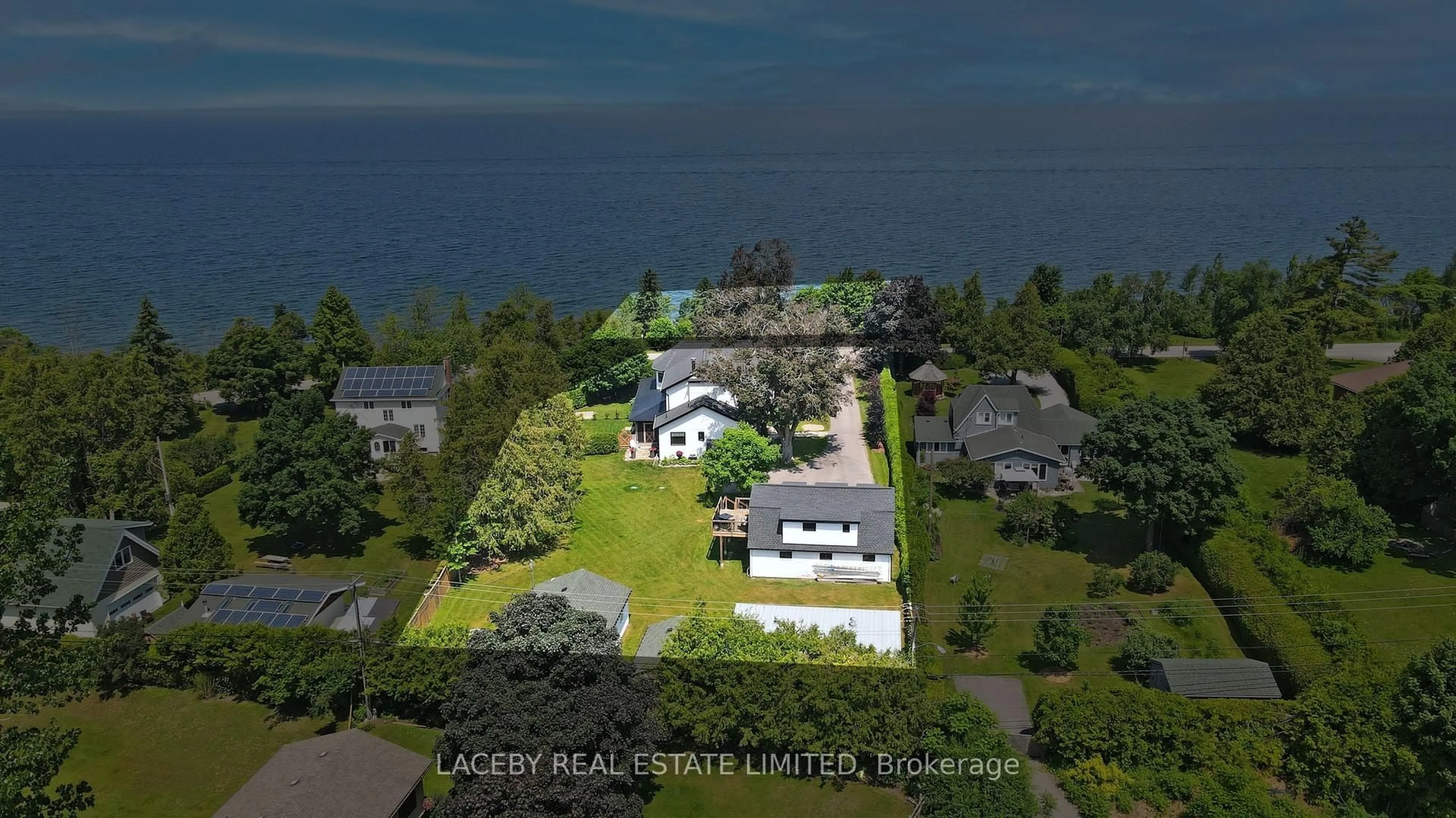 A pic from outside/outdoor area/front of a property/back of a property/a pic from drone, water/lake/river/ocean view for 343 Hedge Rd, Georgina Ontario L0E 1R0
