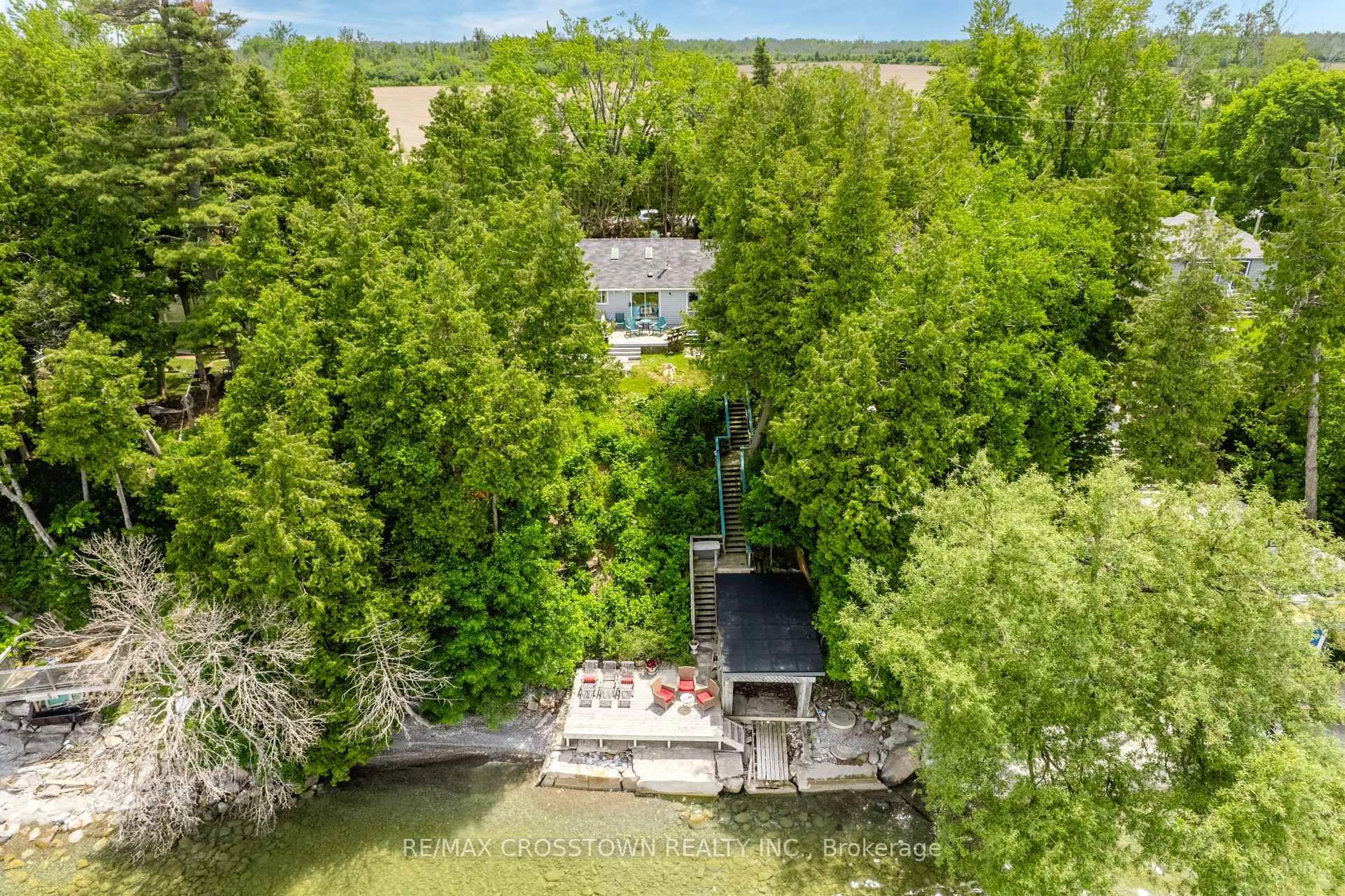 A pic from outside/outdoor area/front of a property/back of a property/a pic from drone, water/lake/river/ocean view for 24890 Thorah Park Blvd, Brock Ontario L0K 1A0