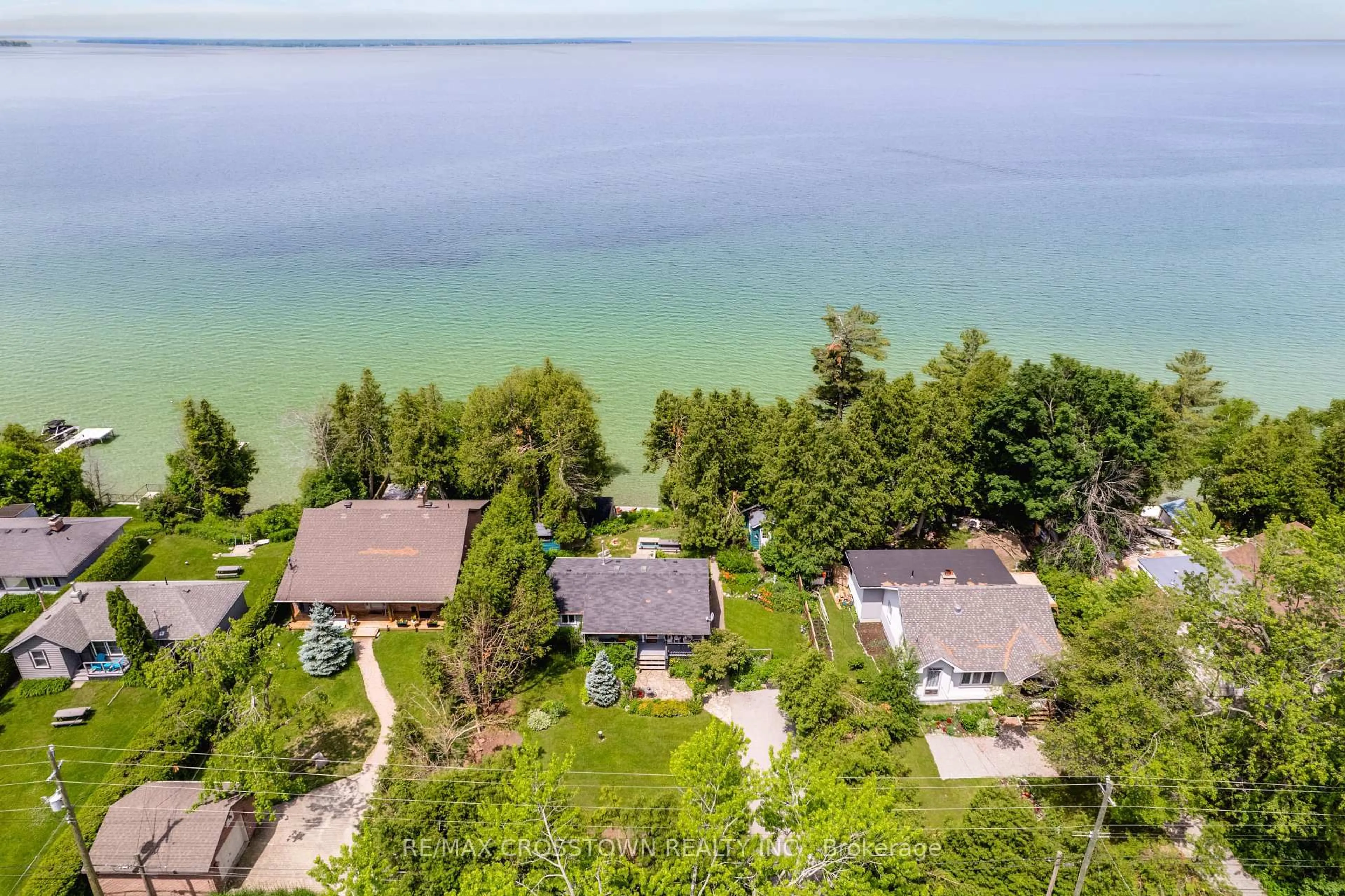 A pic from outside/outdoor area/front of a property/back of a property/a pic from drone, water/lake/river/ocean view for 24890 Thorah Park Blvd, Brock Ontario L0K 1A0
