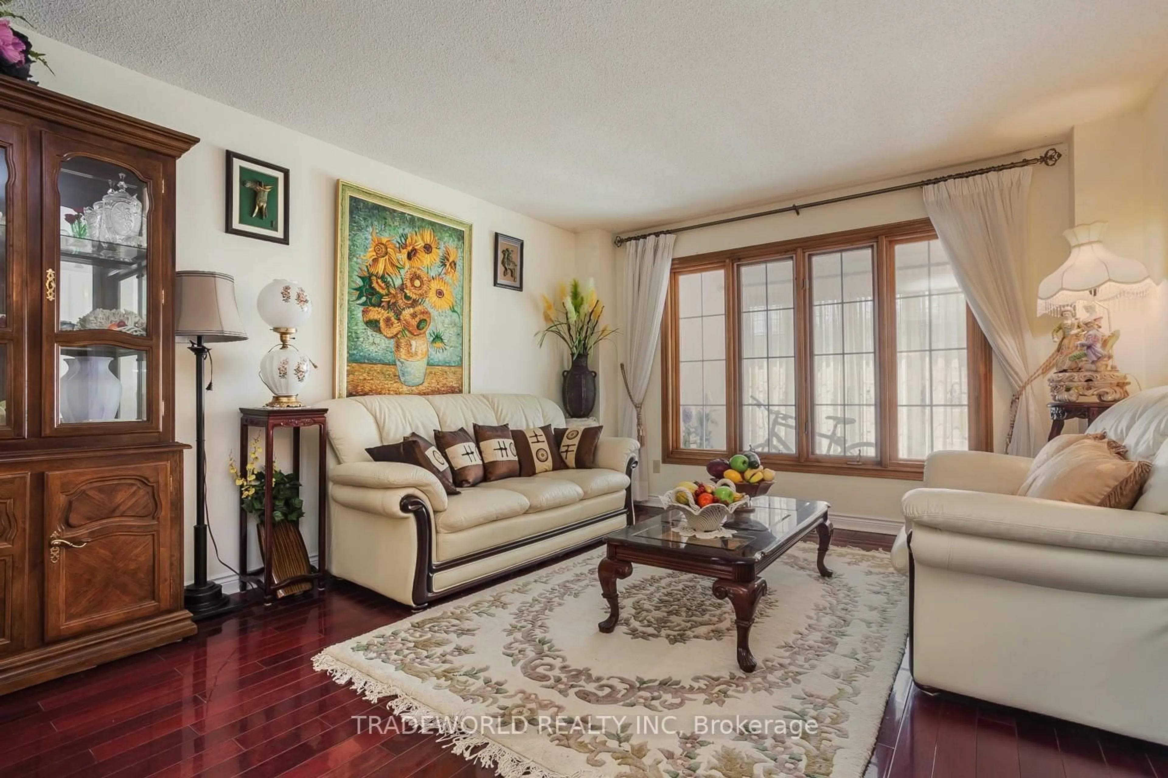 Living room with furniture, wood/laminate floor for 2 Doulton Crt, Markham Ontario L3R 8N8