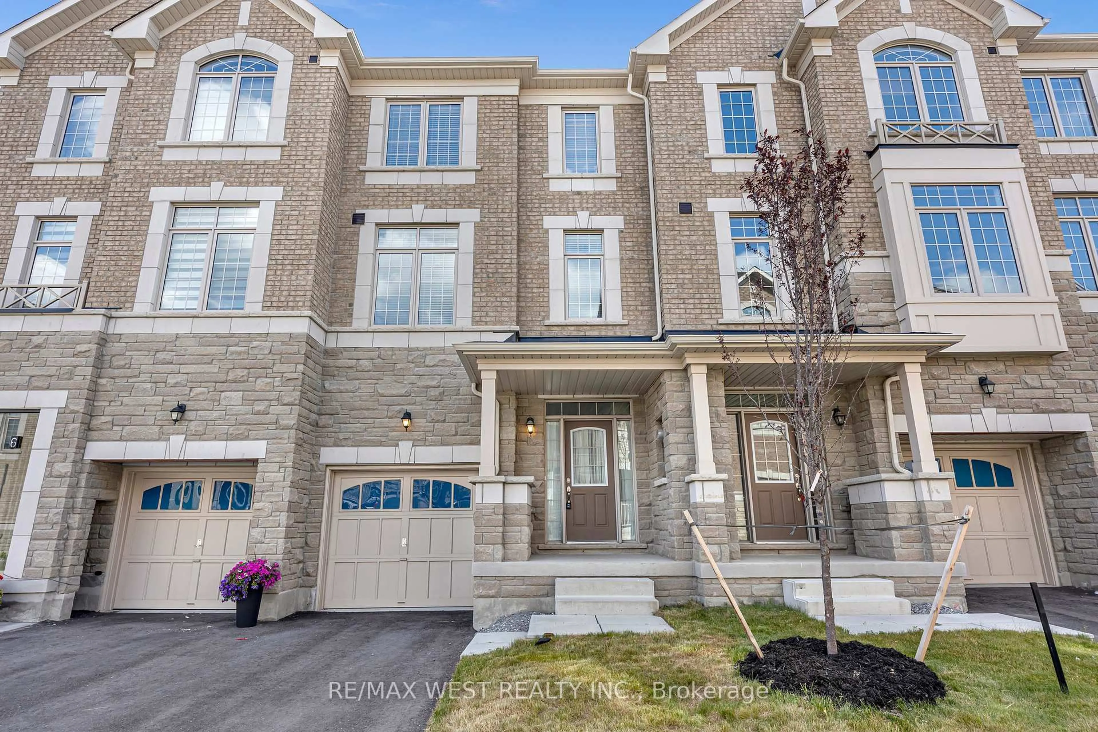 Home with brick exterior material, street for 8 Andress Way, Markham Ontario L3S 0E9