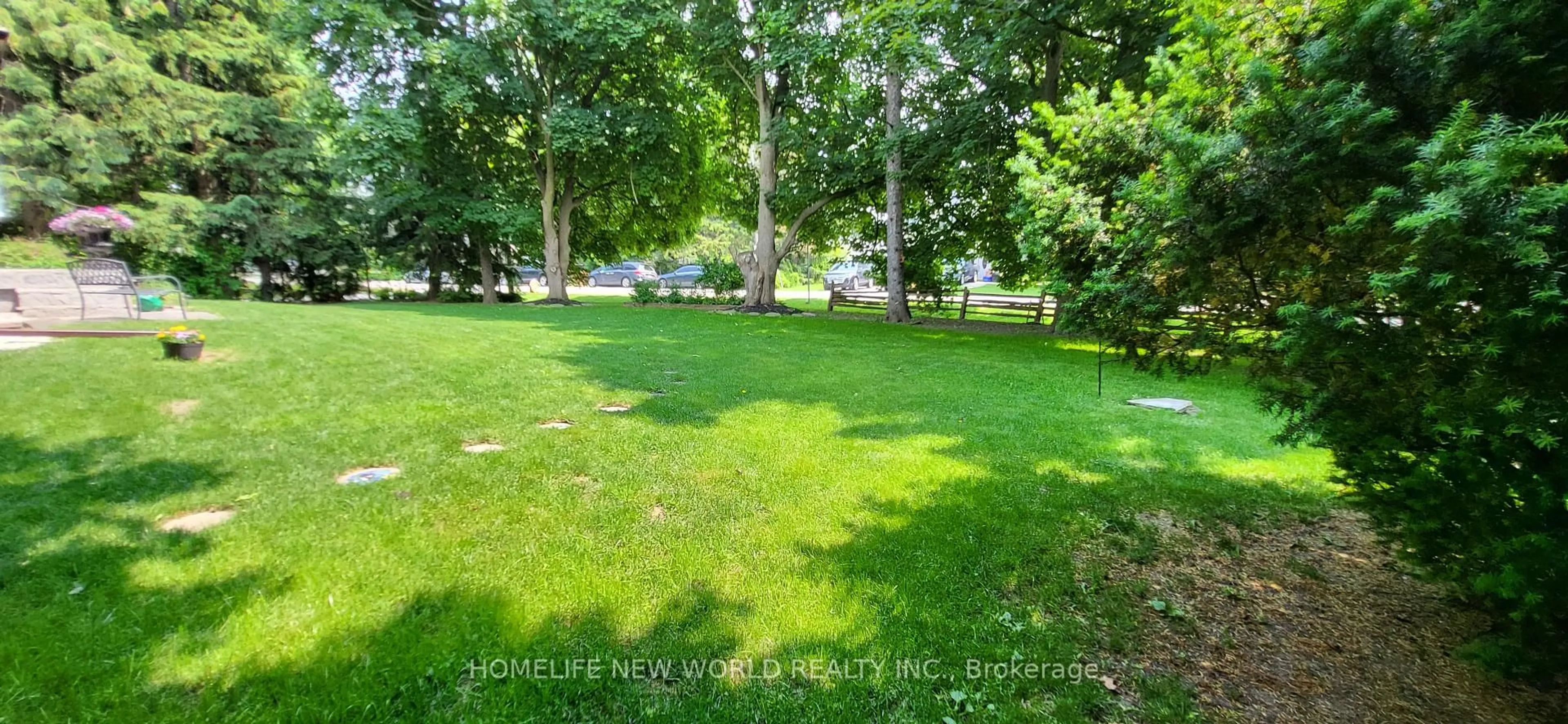 A pic from outside/outdoor area/front of a property/back of a property/a pic from drone, forest/trees view for 12 riverview Rd, Markham Ontario L3P 1E5