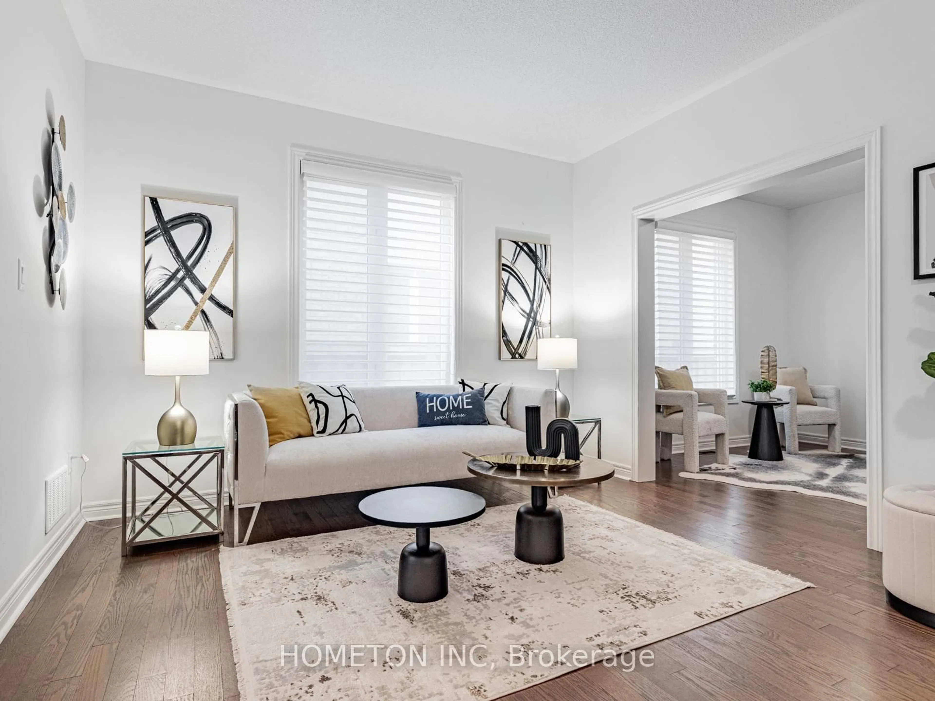 Living room with furniture, wood/laminate floor for 50 Citrine Dr, Bradford West Gwillimbury Ontario L3Z 0T5