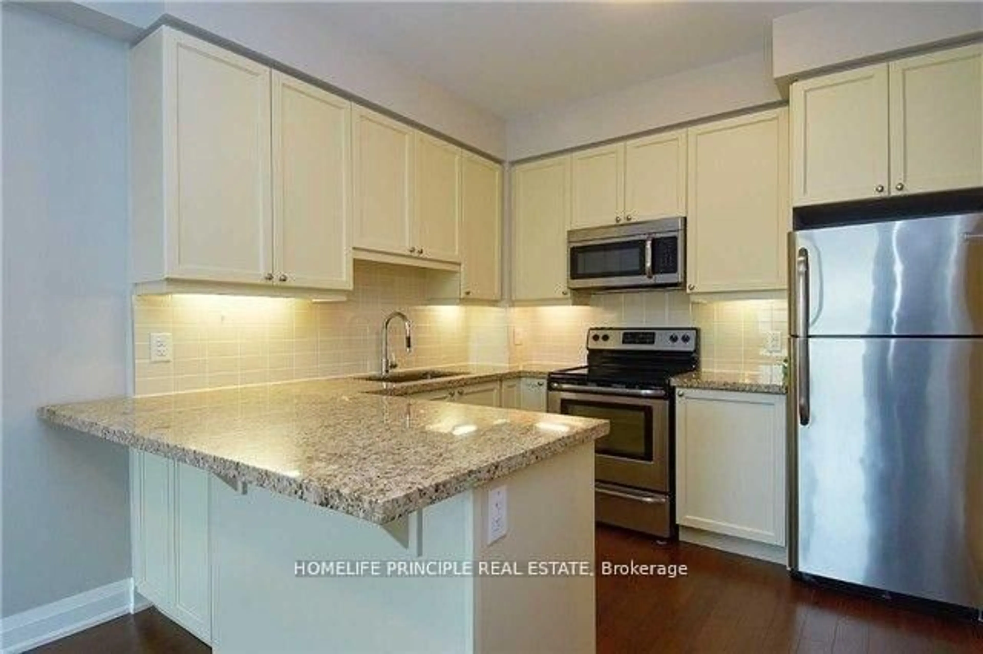 Standard kitchen, ceramic/tile floor for 12 Woodstream Blvd #712, Vaughan Ontario L4L 8C3