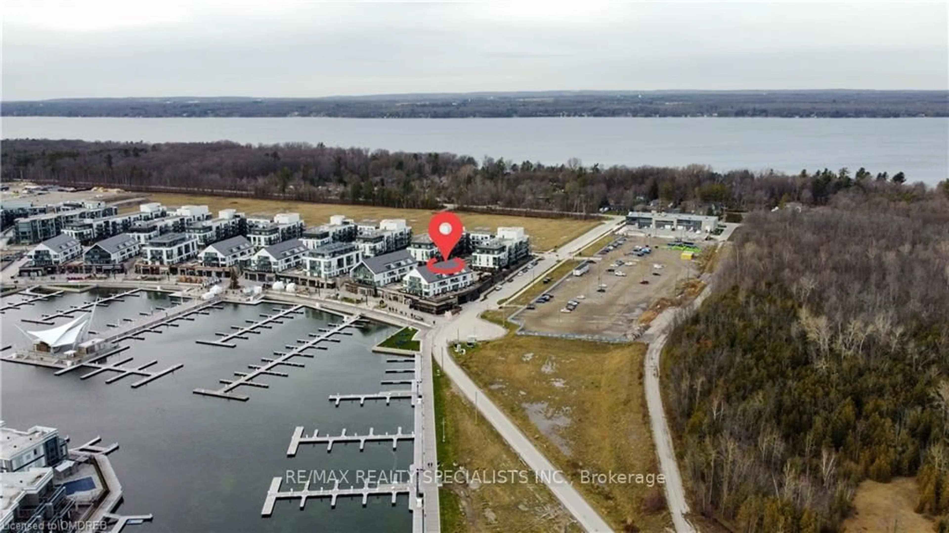 A pic from outside/outdoor area/front of a property/back of a property/a pic from drone, water/lake/river/ocean view for 233 Broward Way #10, Innisfil Ontario L9S 0M1