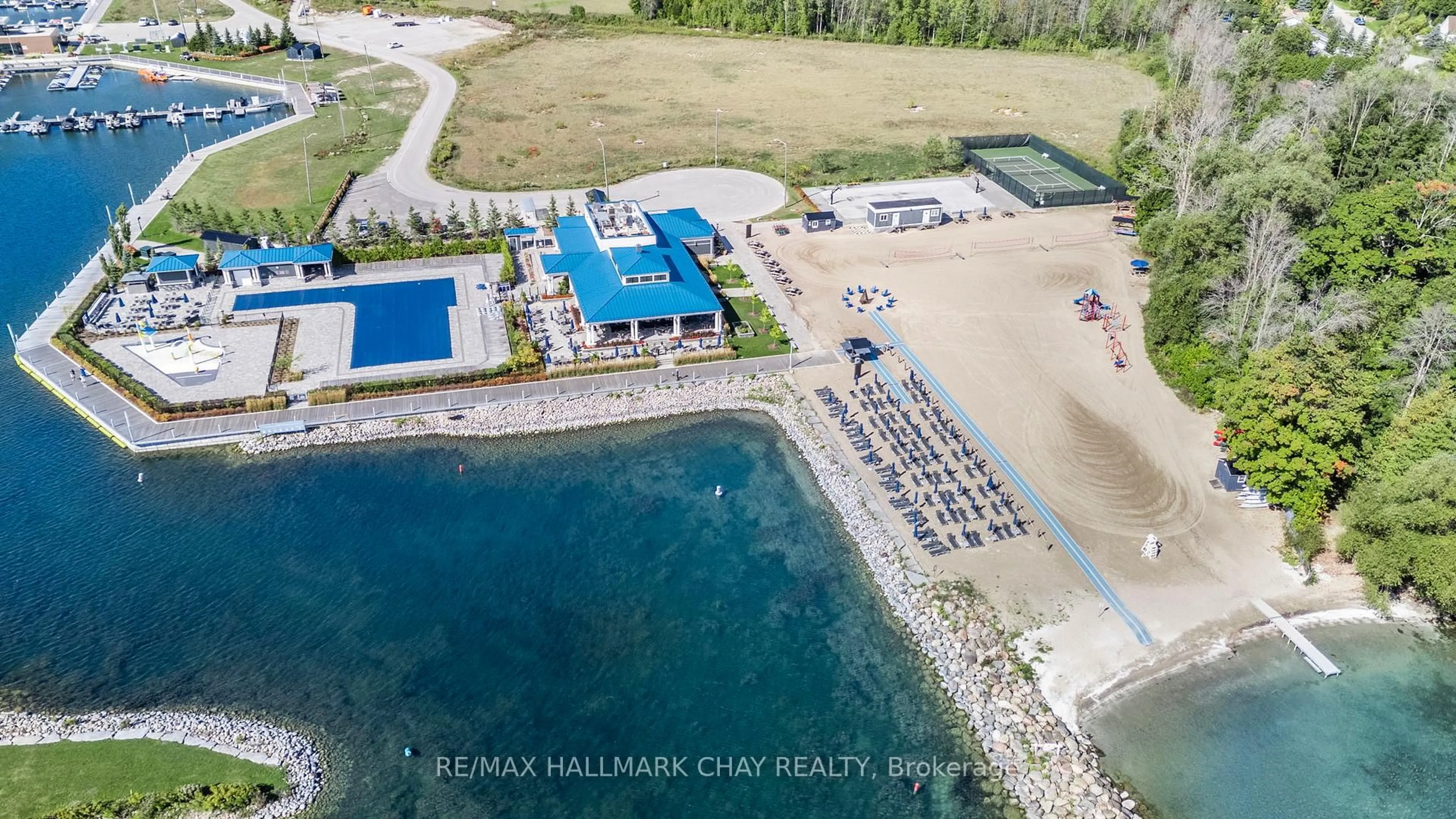A pic from outside/outdoor area/front of a property/back of a property/a pic from drone, water/lake/river/ocean view for 333 Sea Ray Ave #207D, Innisfil Ontario L9S 0J4