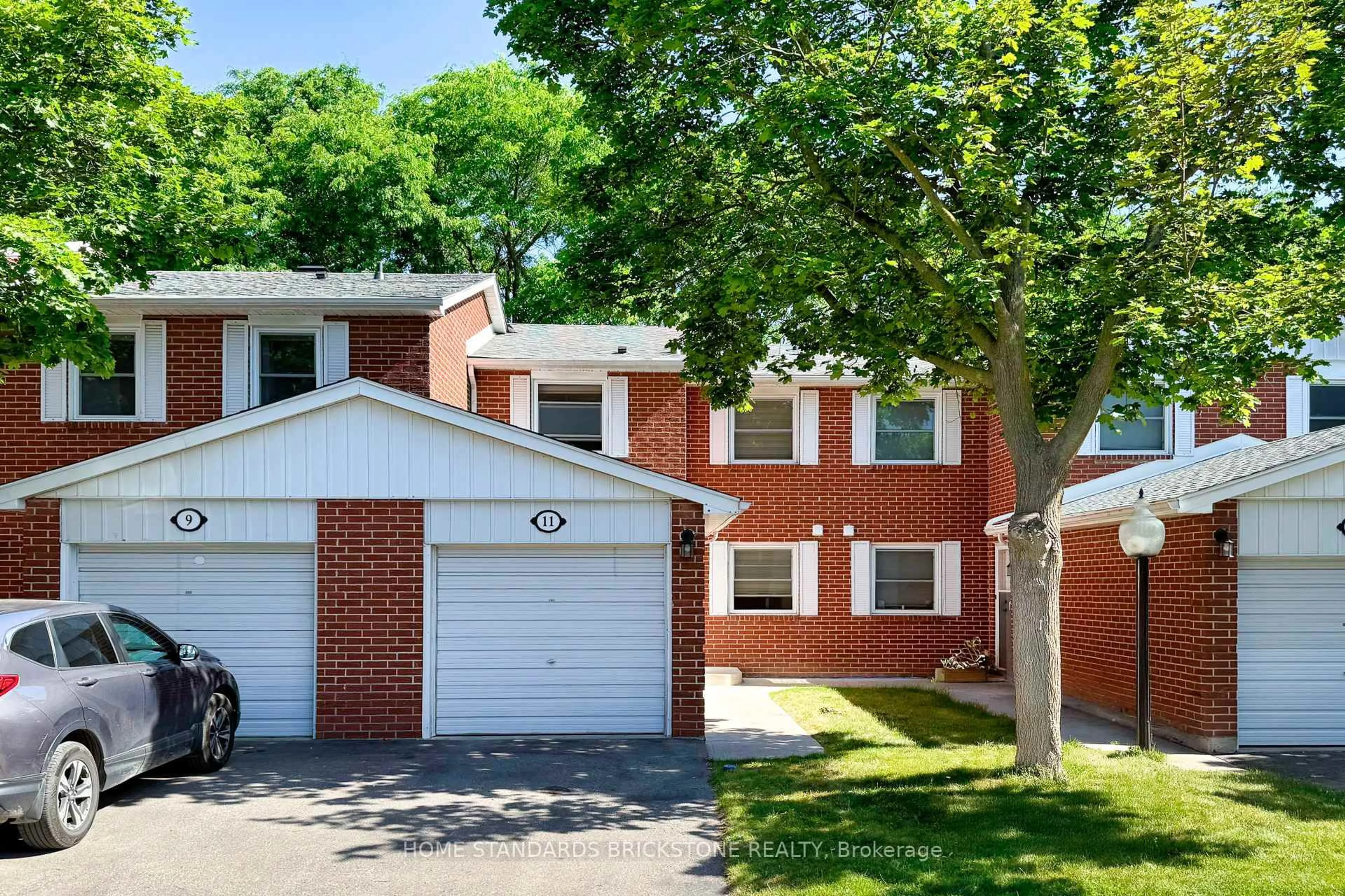 Home with brick exterior material, street for 11 Reith Way, Markham Ontario L3T 5C6