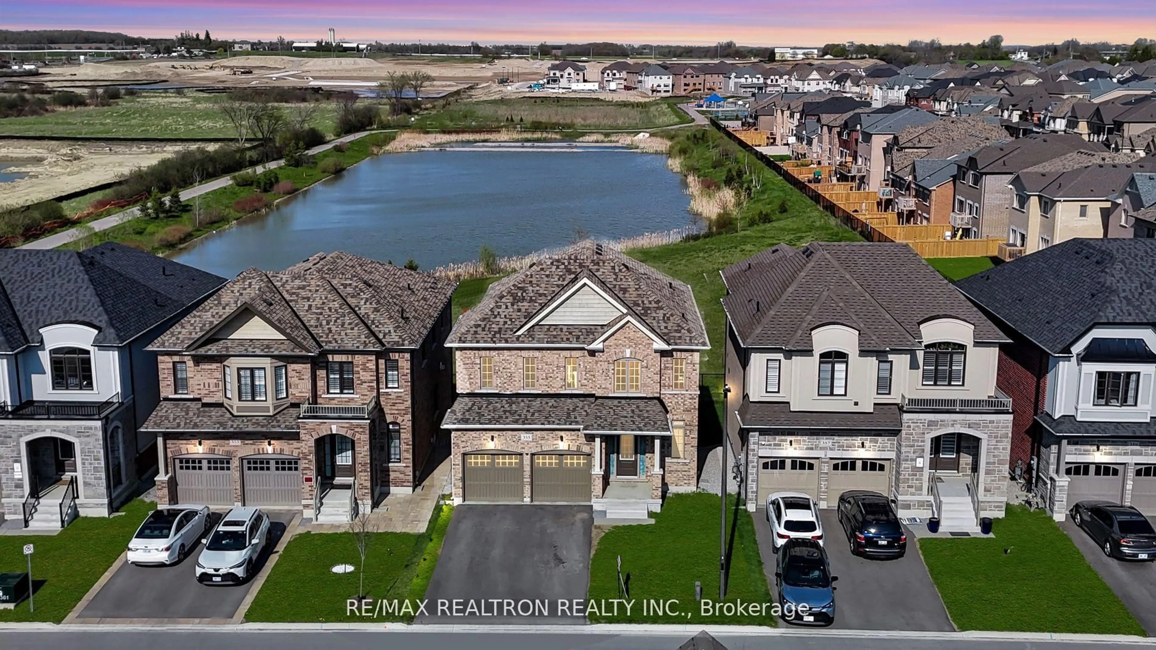 A pic from outside/outdoor area/front of a property/back of a property/a pic from drone, water/lake/river/ocean view for 355 Danny Wheeler Blvd, Georgina Ontario L4P 3C8