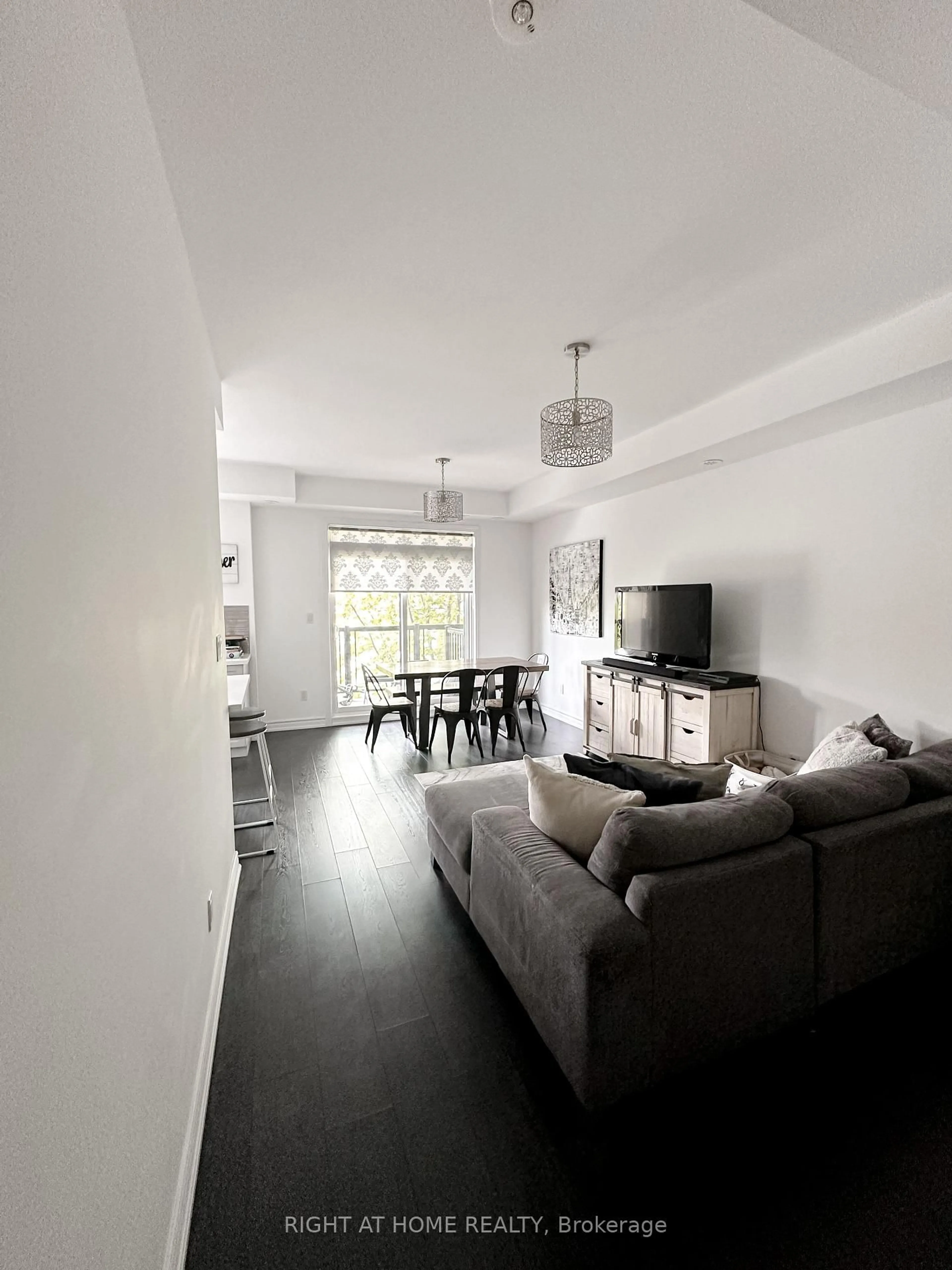 Living room with furniture, unknown for 201 Pine Grove Rd #423, Vaughan Ontario L4L 0H8