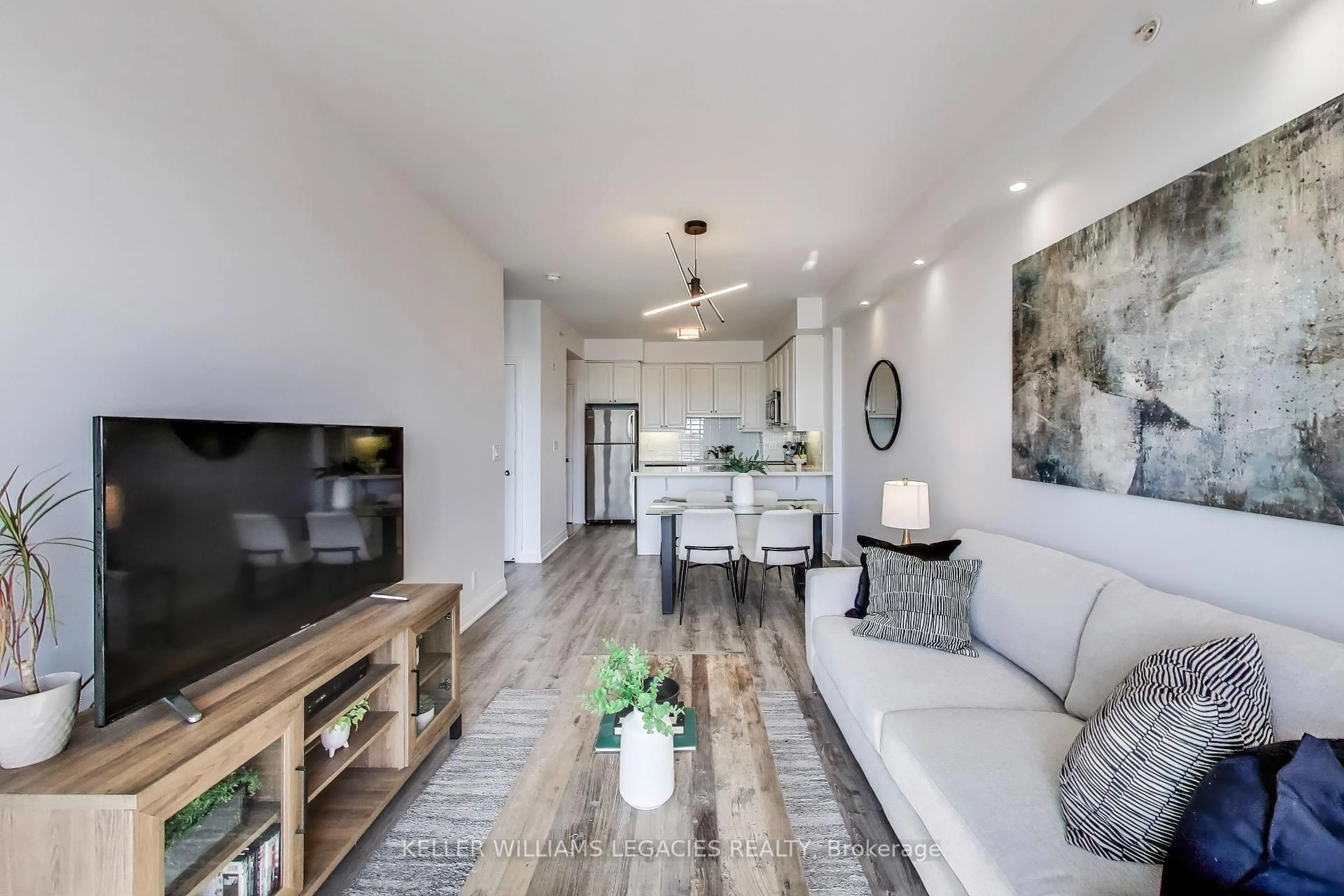 Living room with furniture, unknown for 12 Woodstream Blvd #704, Vaughan Ontario L4L 8C4