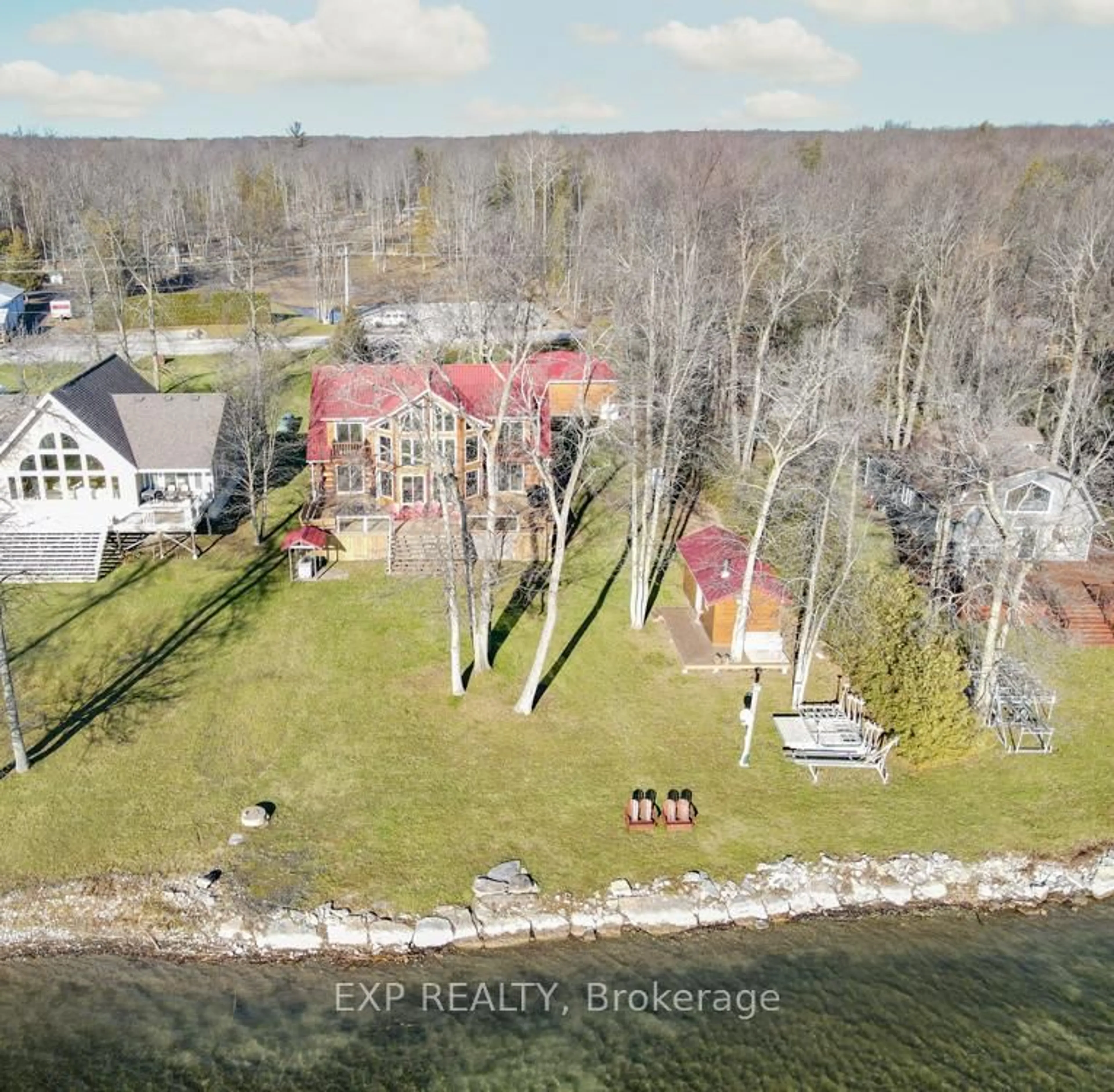 A pic from outside/outdoor area/front of a property/back of a property/a pic from drone, water/lake/river/ocean view for 332 Bear Rd, Georgina Islands Ontario L0E 1R0