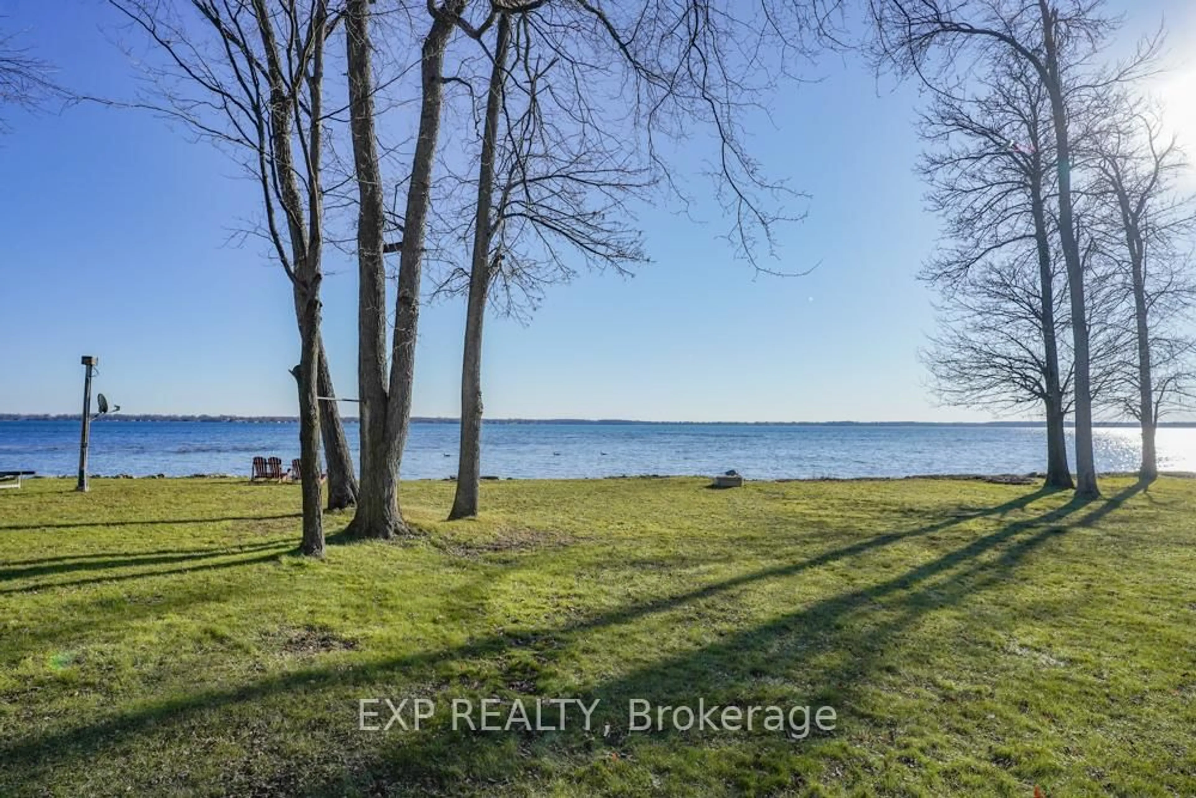 A pic from outside/outdoor area/front of a property/back of a property/a pic from drone, water/lake/river/ocean view for 332 Bear Rd, Georgina Islands Ontario L0E 1R0