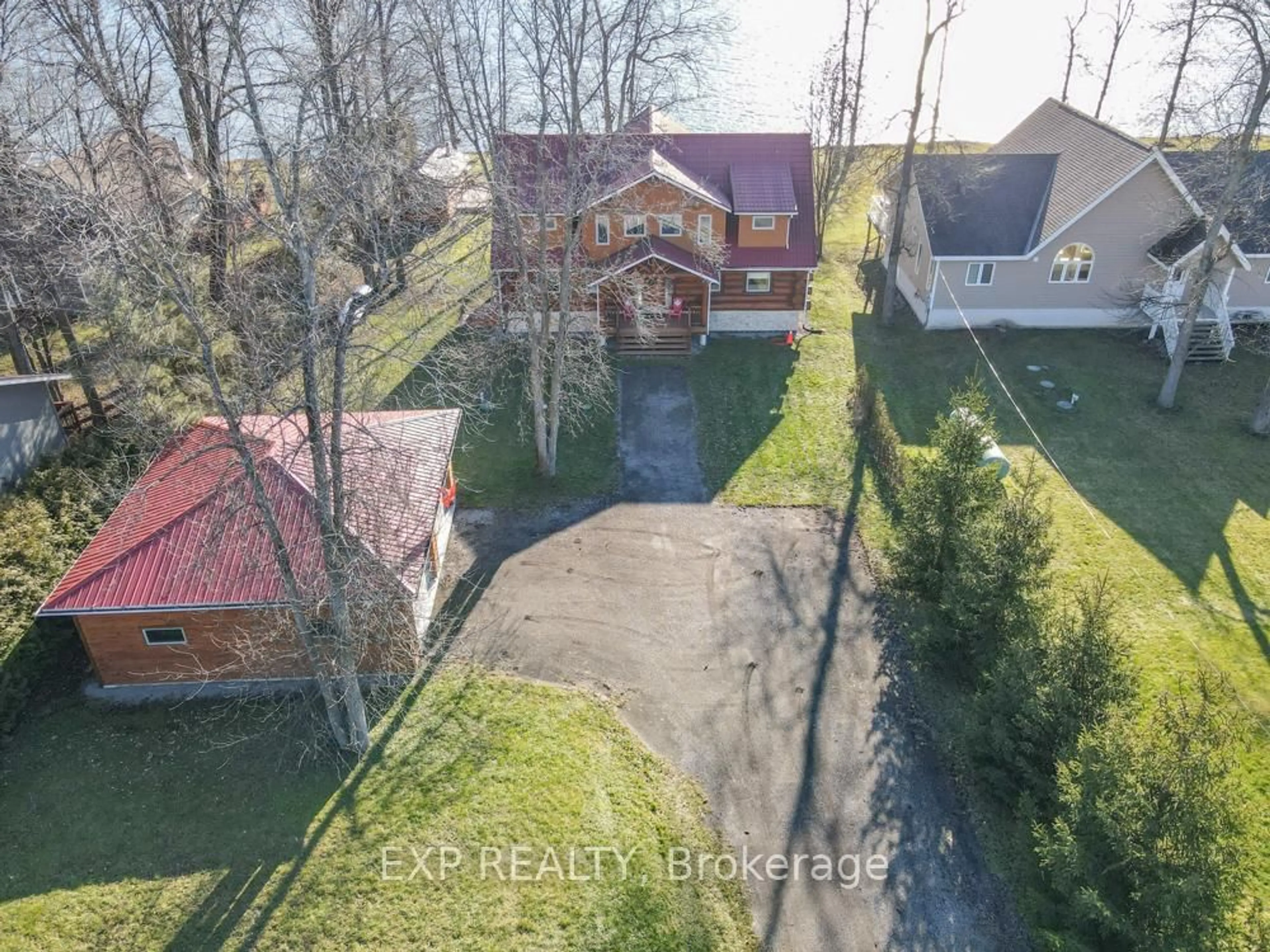 A pic from outside/outdoor area/front of a property/back of a property/a pic from drone, unknown for 332 Bear Rd, Georgina Islands Ontario L0E 1R0