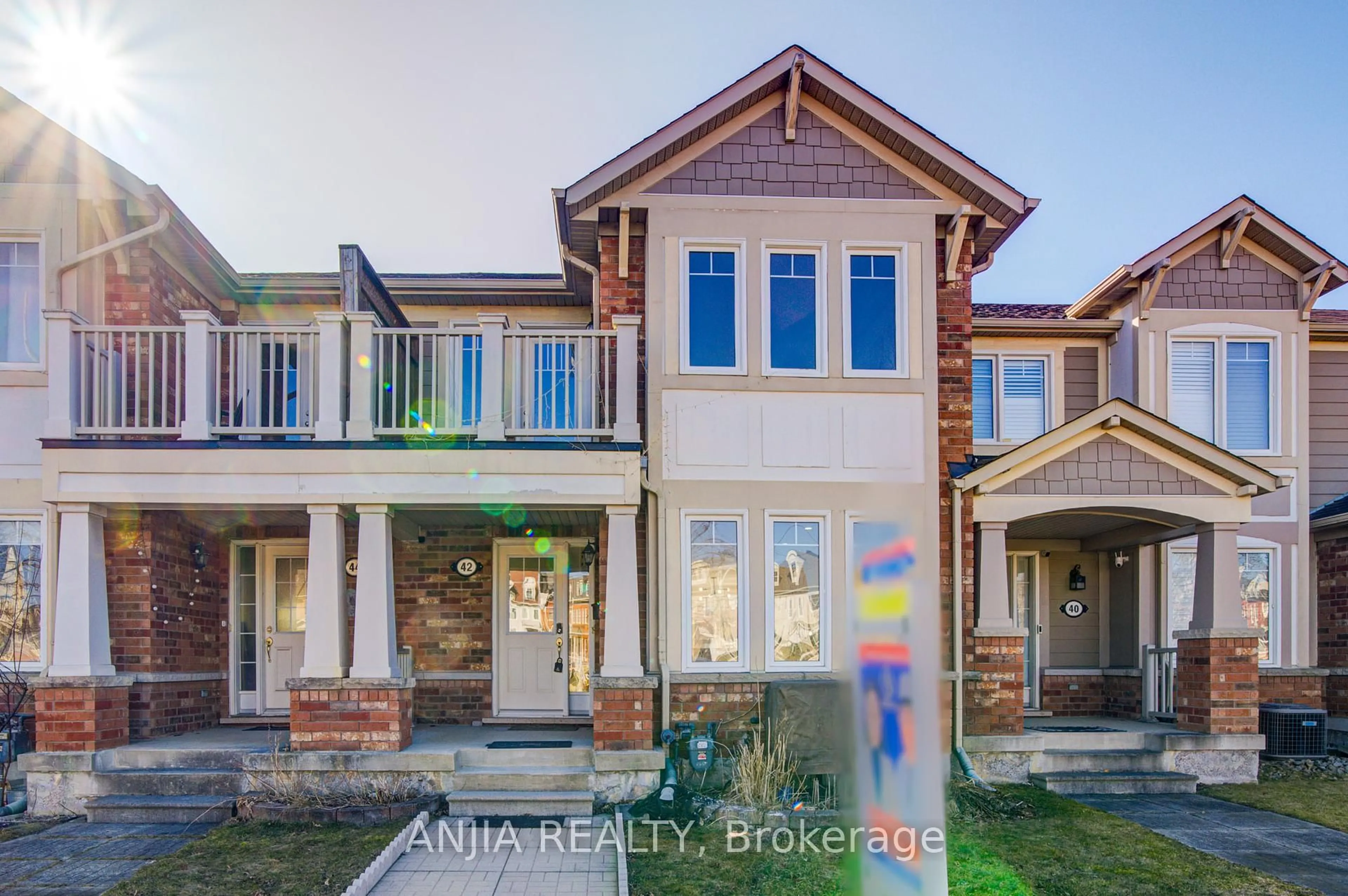 Home with brick exterior material, street for 42 Gas Lamp Lane, Markham Ontario L6B 0H5