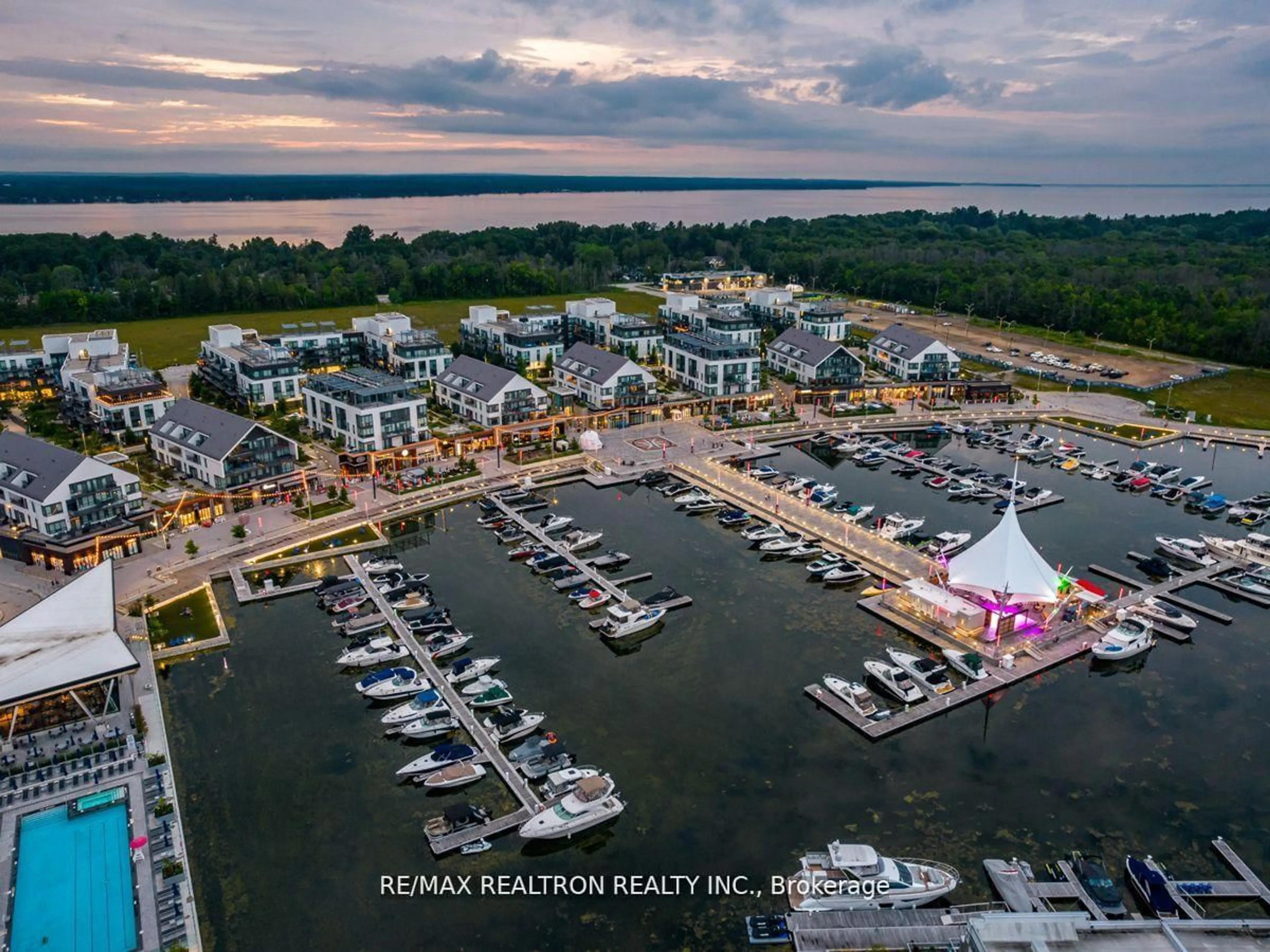 A pic from outside/outdoor area/front of a property/back of a property/a pic from drone, water/lake/river/ocean view for 3647 Riva Ave, Innisfil Ontario L9S 3M3