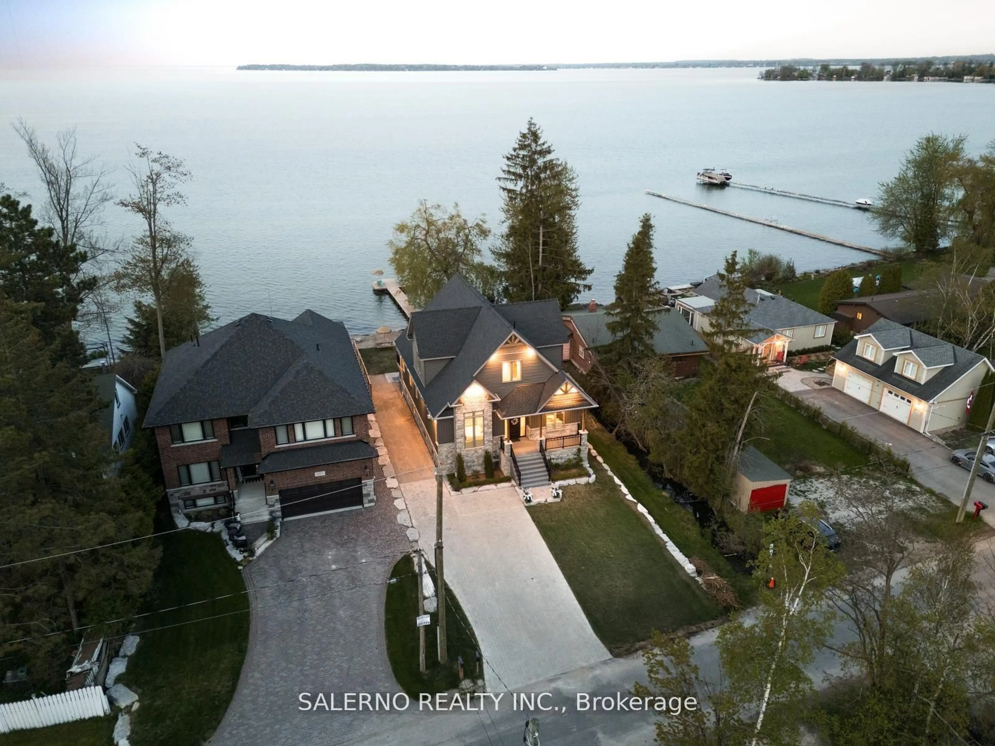 A pic from outside/outdoor area/front of a property/back of a property/a pic from drone, water/lake/river/ocean view for 1889 Simcoe Blvd, Innisfil Ontario L9S 4N3