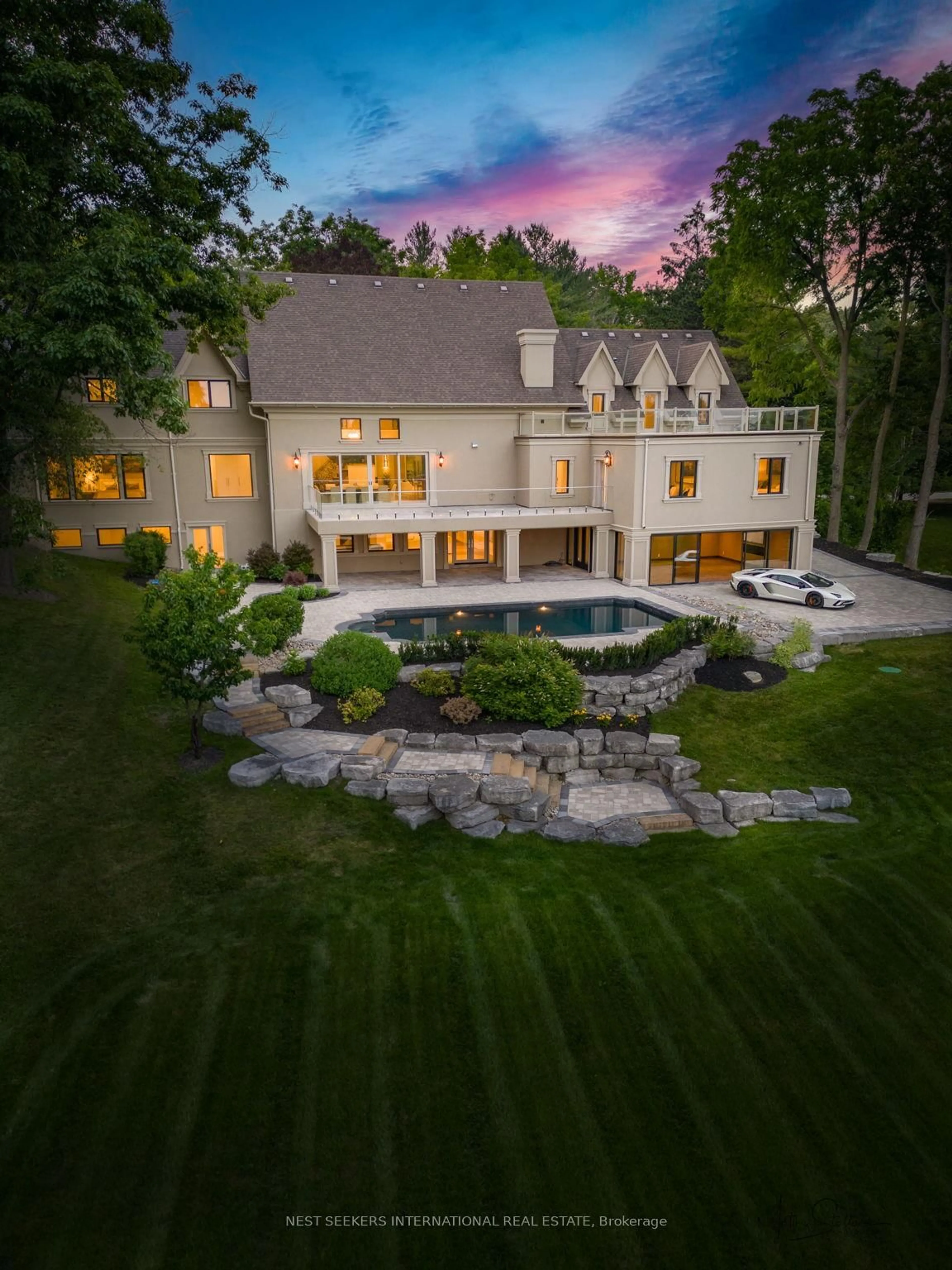 A pic from outside/outdoor area/front of a property/back of a property/a pic from drone, water/lake/river/ocean view for 141 Kingscross Dr, King Ontario L7B 1E6