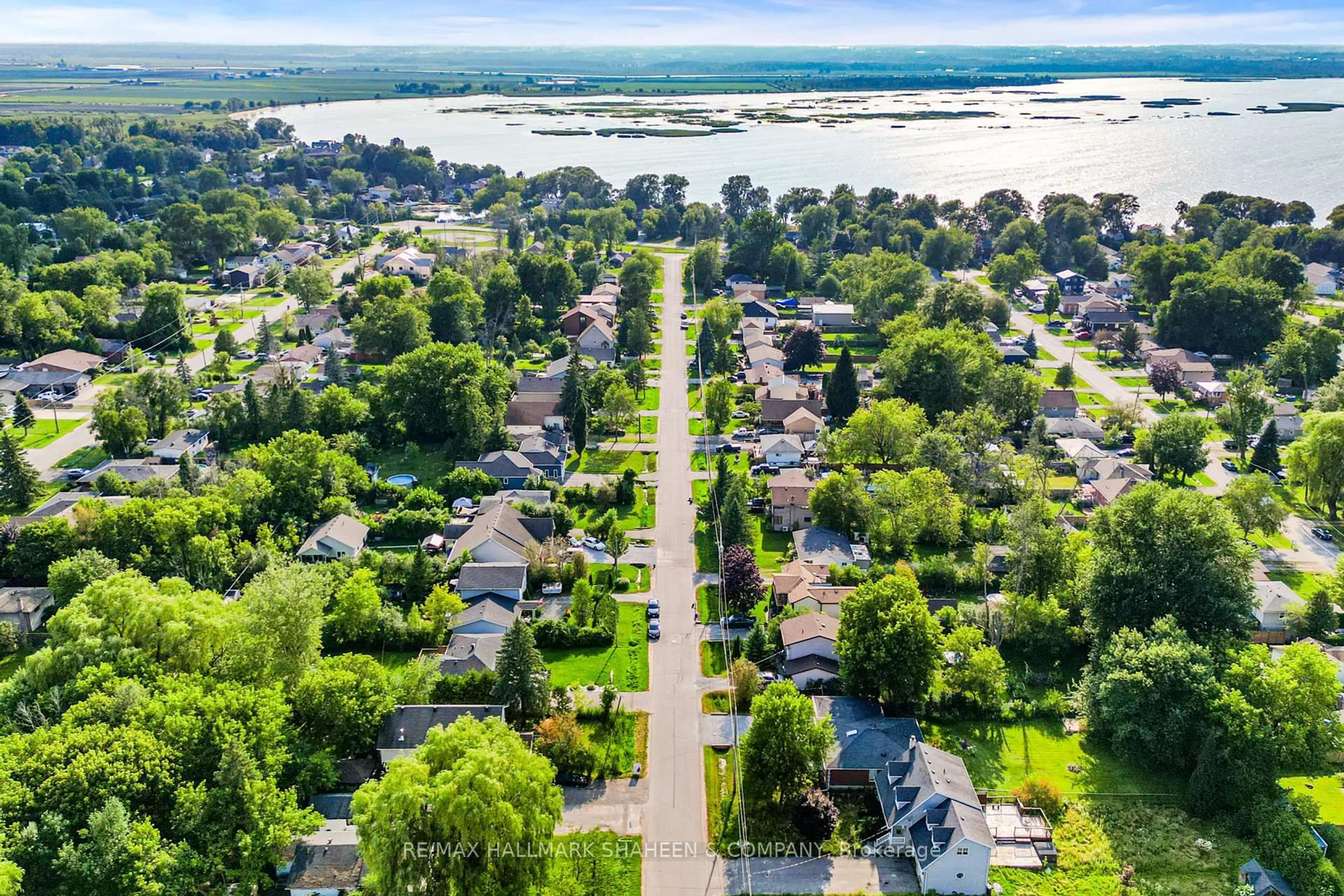 A pic from outside/outdoor area/front of a property/back of a property/a pic from drone, water/lake/river/ocean view for 312 Terrace Dr, Georgina Ontario L4P 2Y8
