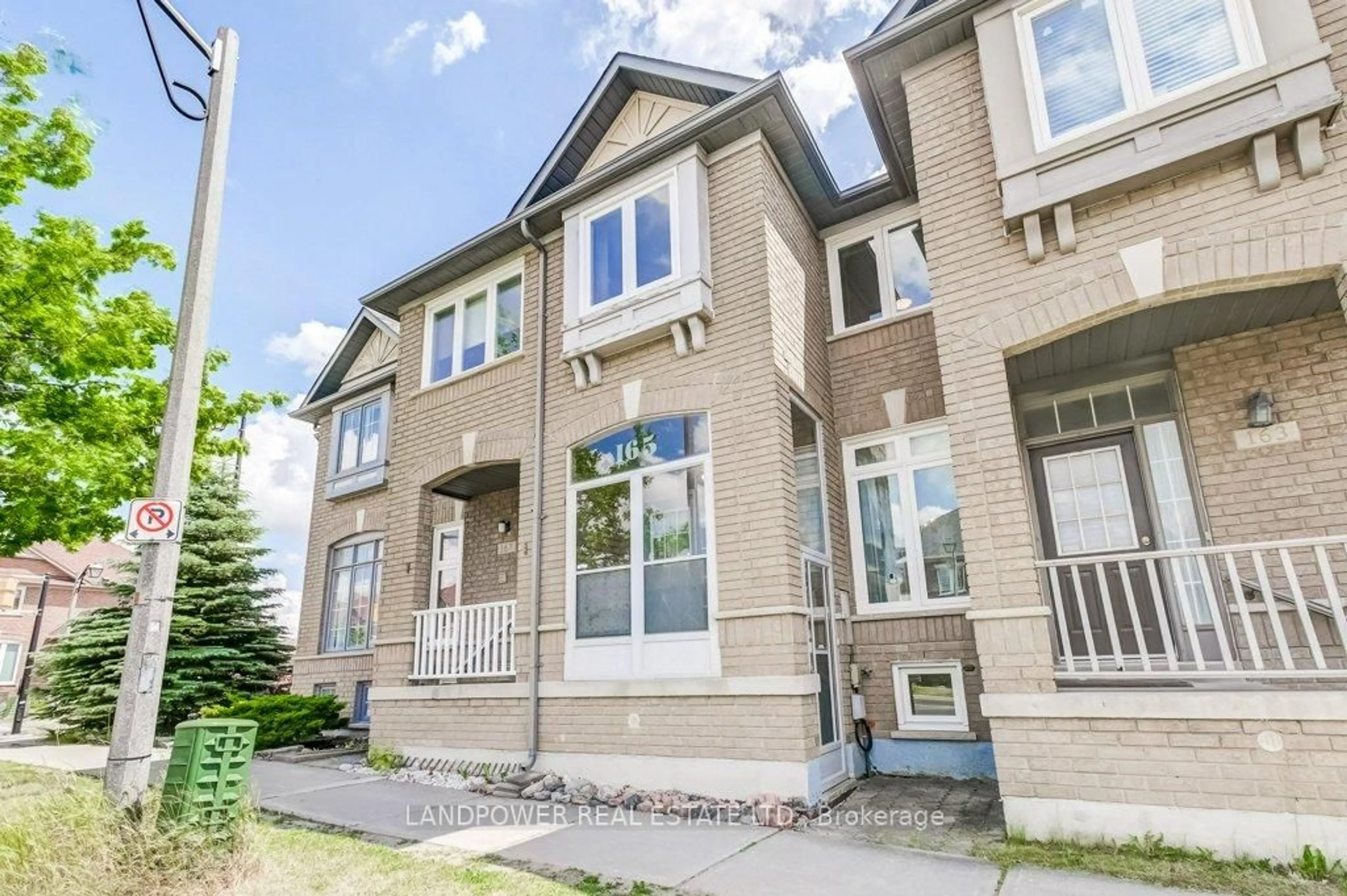 Home with brick exterior material, street for 165 Bur Oak Ave, Markham Ontario L6C 2G1