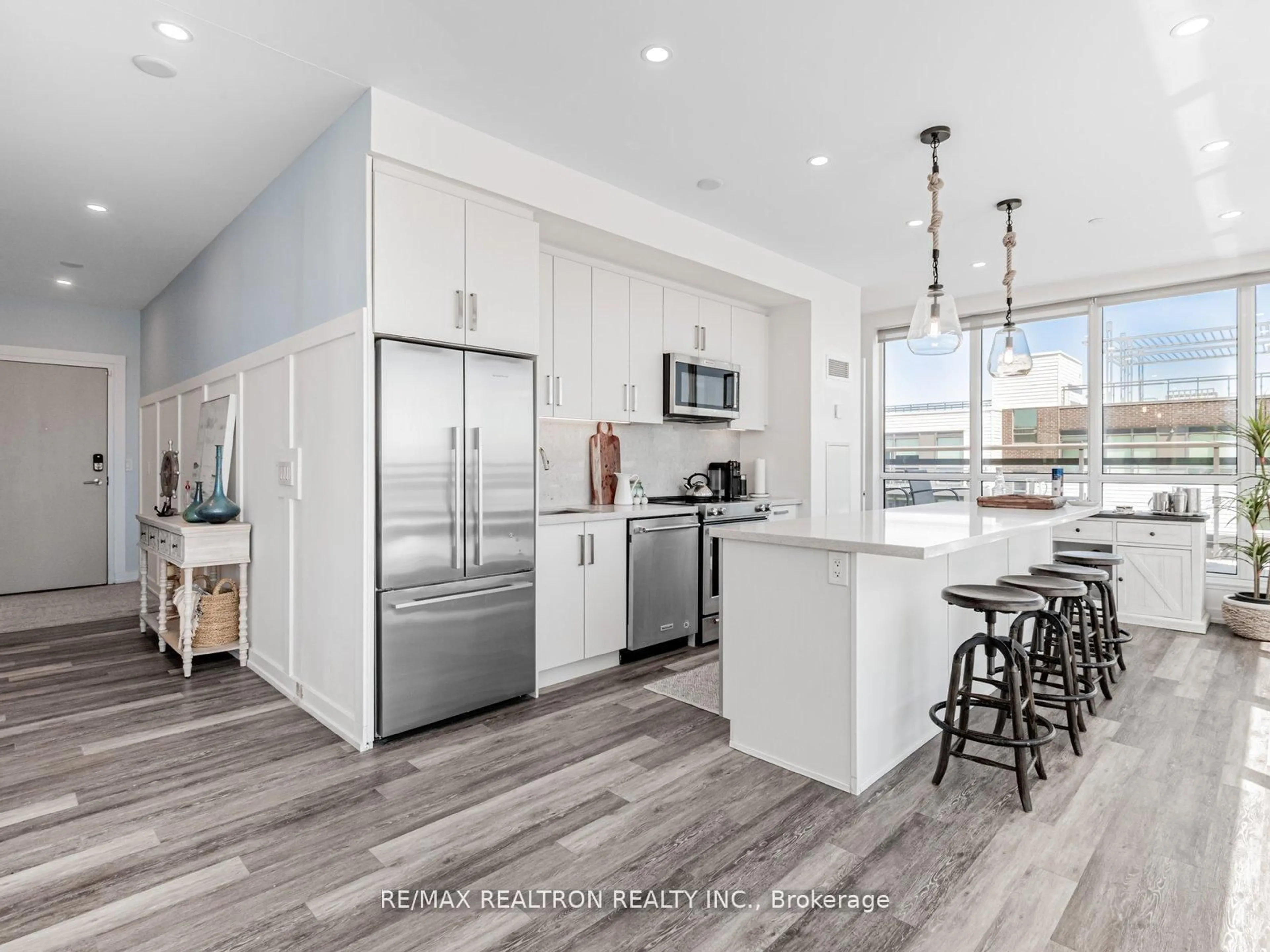Open concept kitchen, ceramic/tile floor for 241 Sea Ray Ave #A407, Innisfil Ontario L9S 0J9