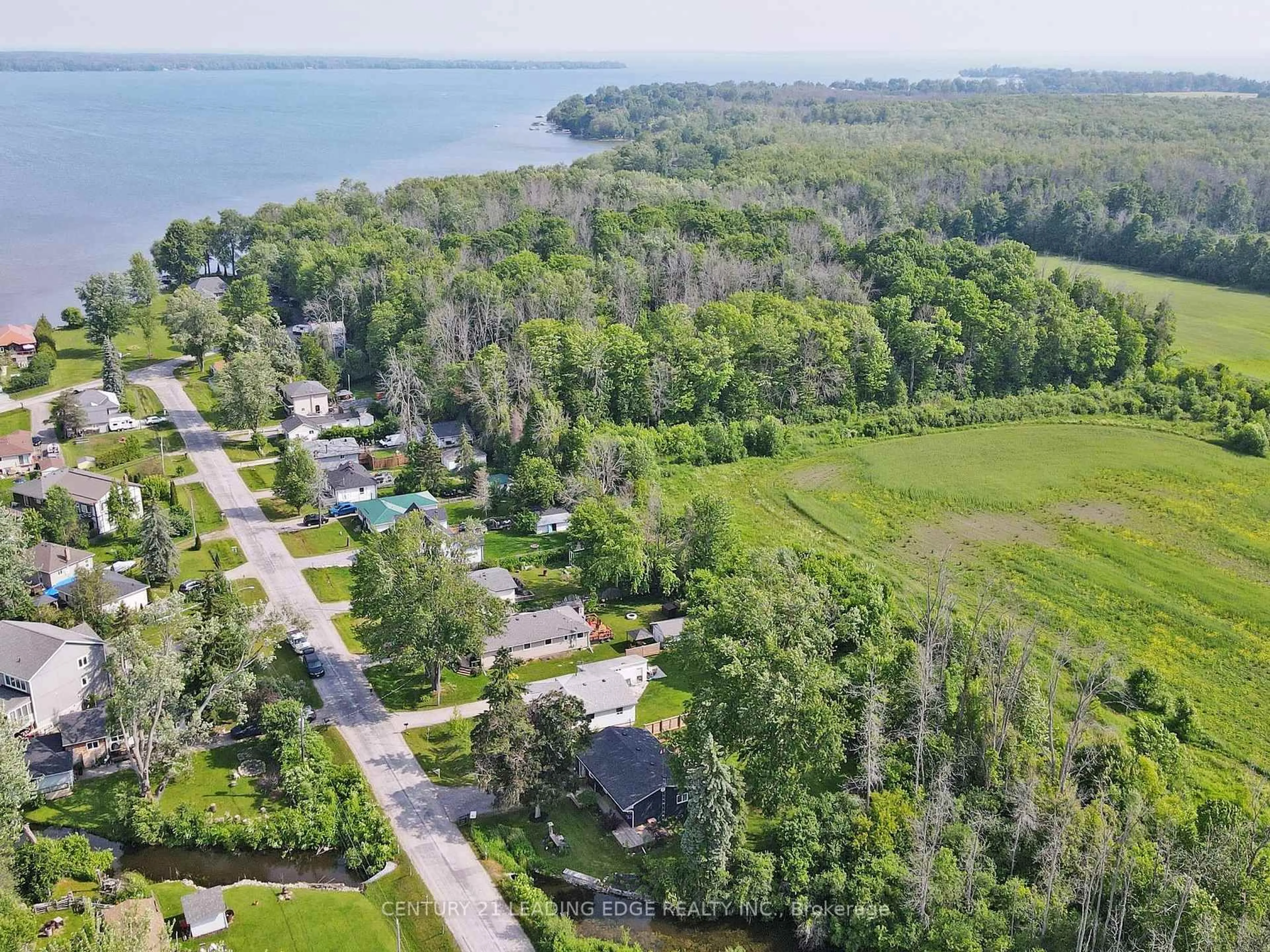 A pic from outside/outdoor area/front of a property/back of a property/a pic from drone, water/lake/river/ocean view for 27 Isle Vista Dr, Georgina Ontario L0E 1N0