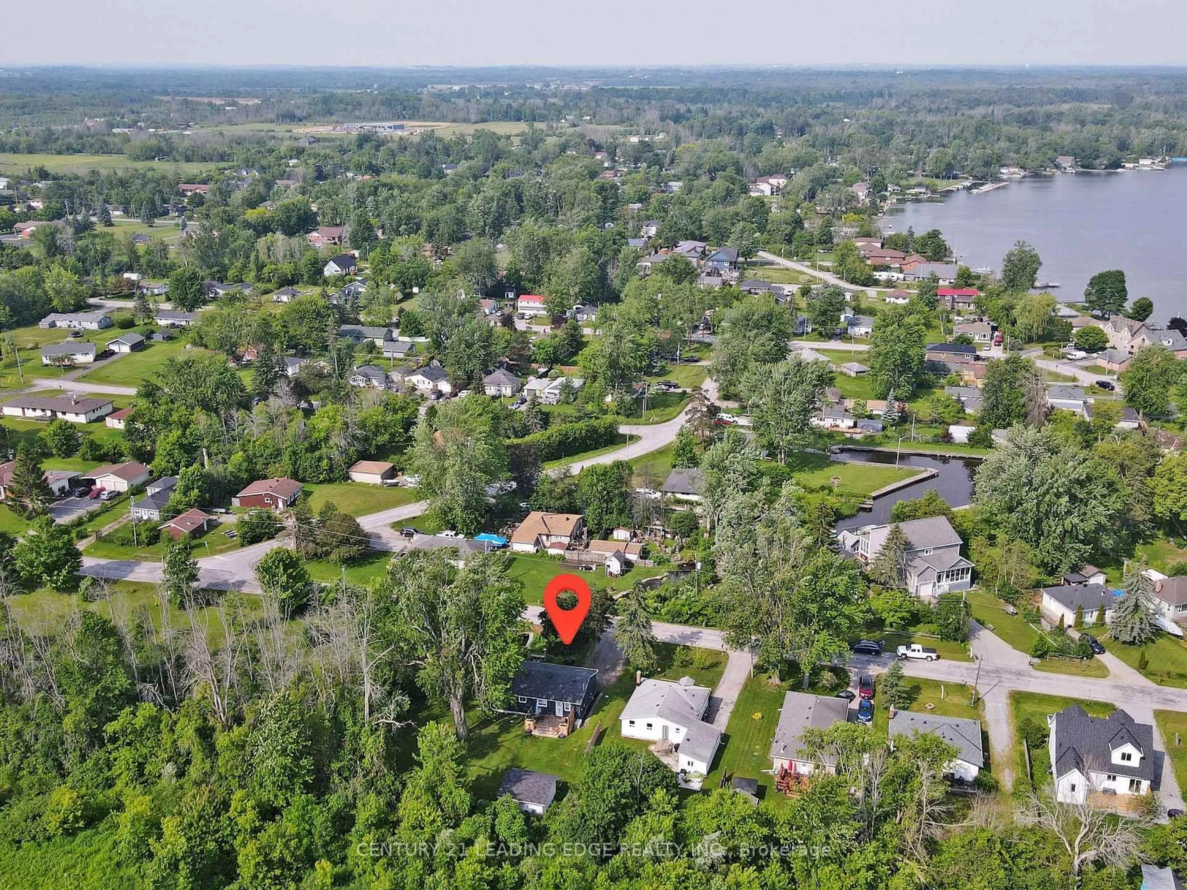 A pic from outside/outdoor area/front of a property/back of a property/a pic from drone, forest/trees view for 27 Isle Vista Dr, Georgina Ontario L0E 1N0