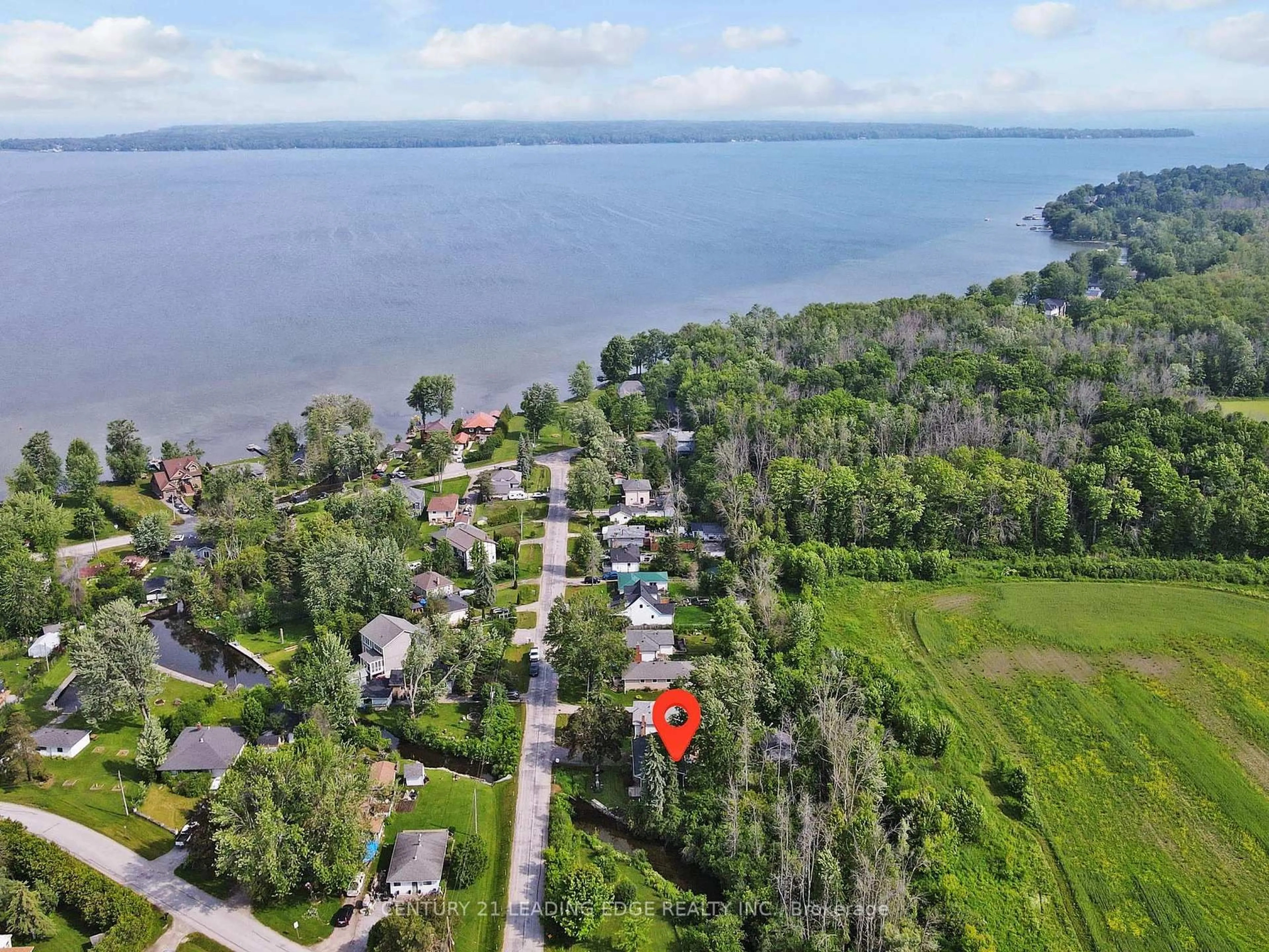 A pic from outside/outdoor area/front of a property/back of a property/a pic from drone, water/lake/river/ocean view for 27 Isle Vista Dr, Georgina Ontario L0E 1N0