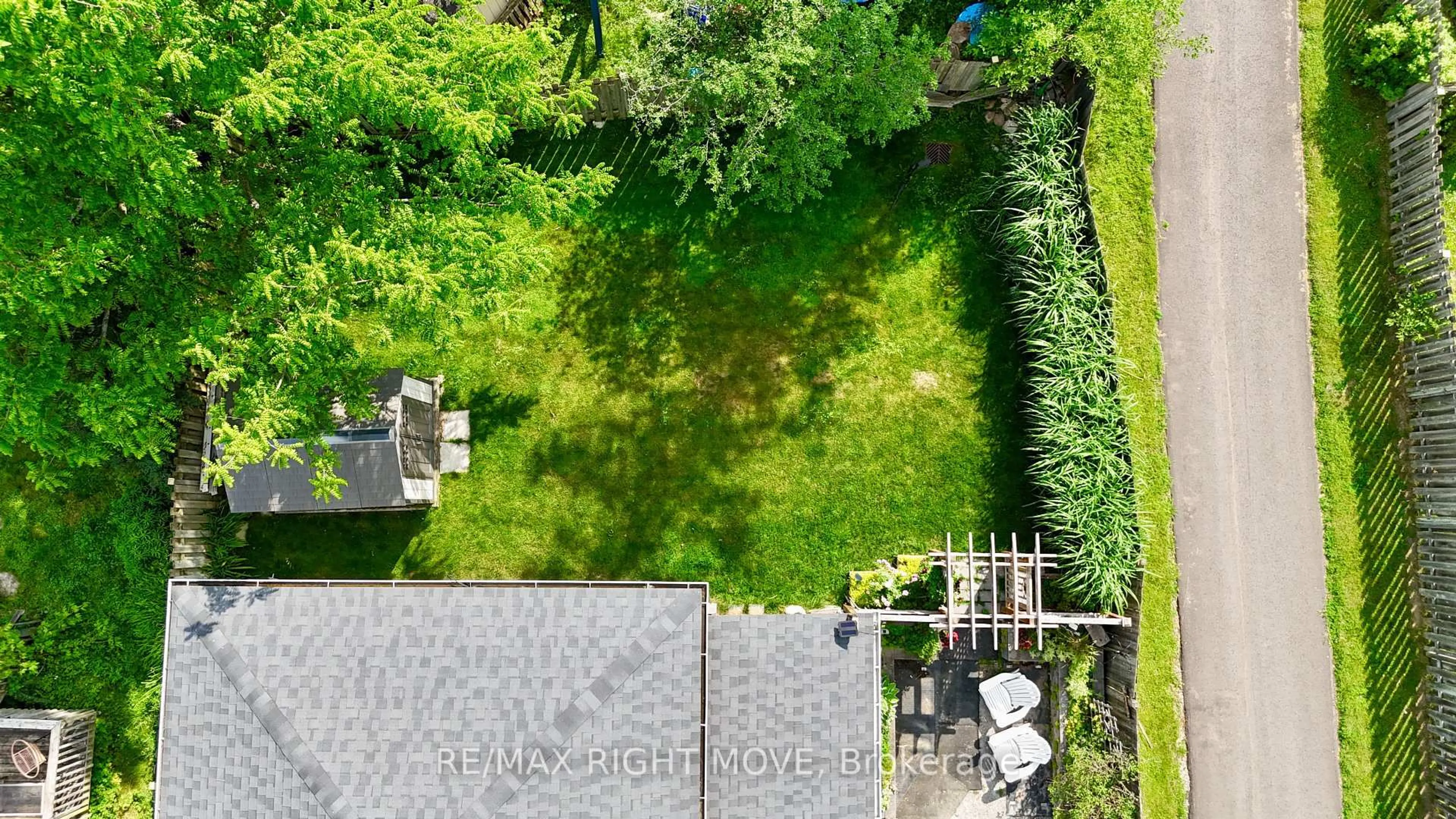 A pic from outside/outdoor area/front of a property/back of a property/a pic from drone, street for 12 Hawkins St, Georgina Ontario L0E 1R0
